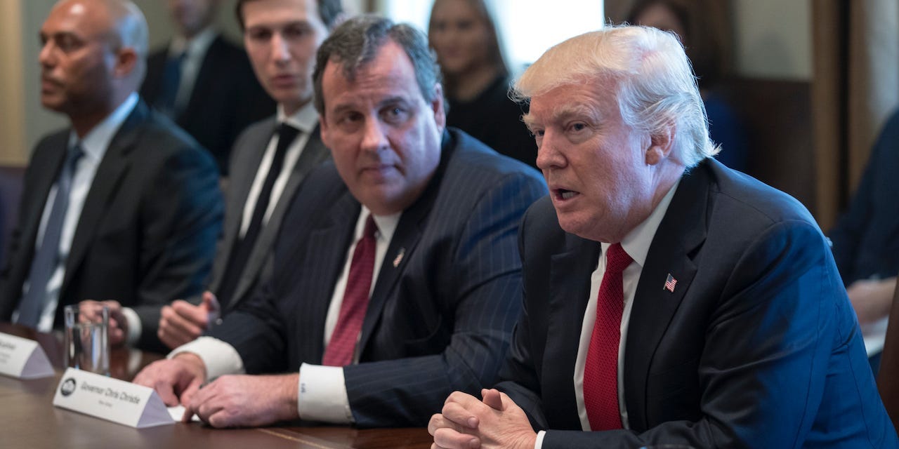 Former President Donald Trump (L) and New Jersey Gov. Chris Christie attend a panel discussion on an opioid and drug abuse in the Roosevelt Room of the White House March 29, 2017 in Washington, DC.