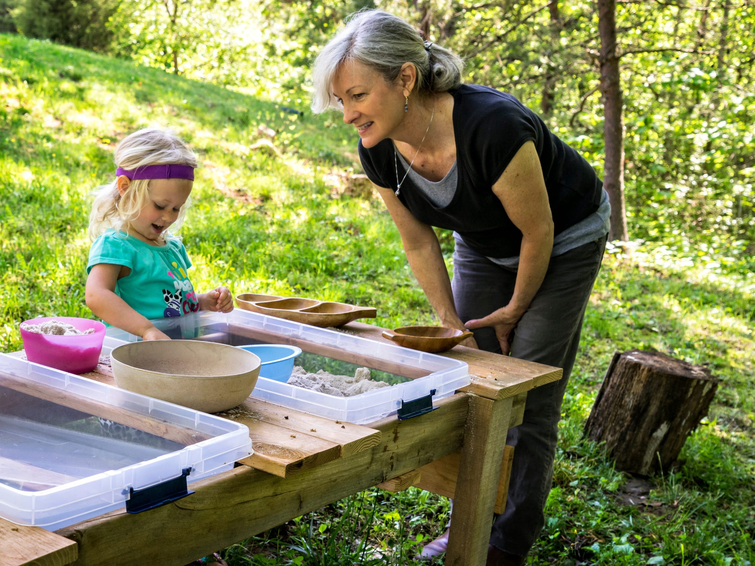 Woman Teacher and Girl in a Preschool