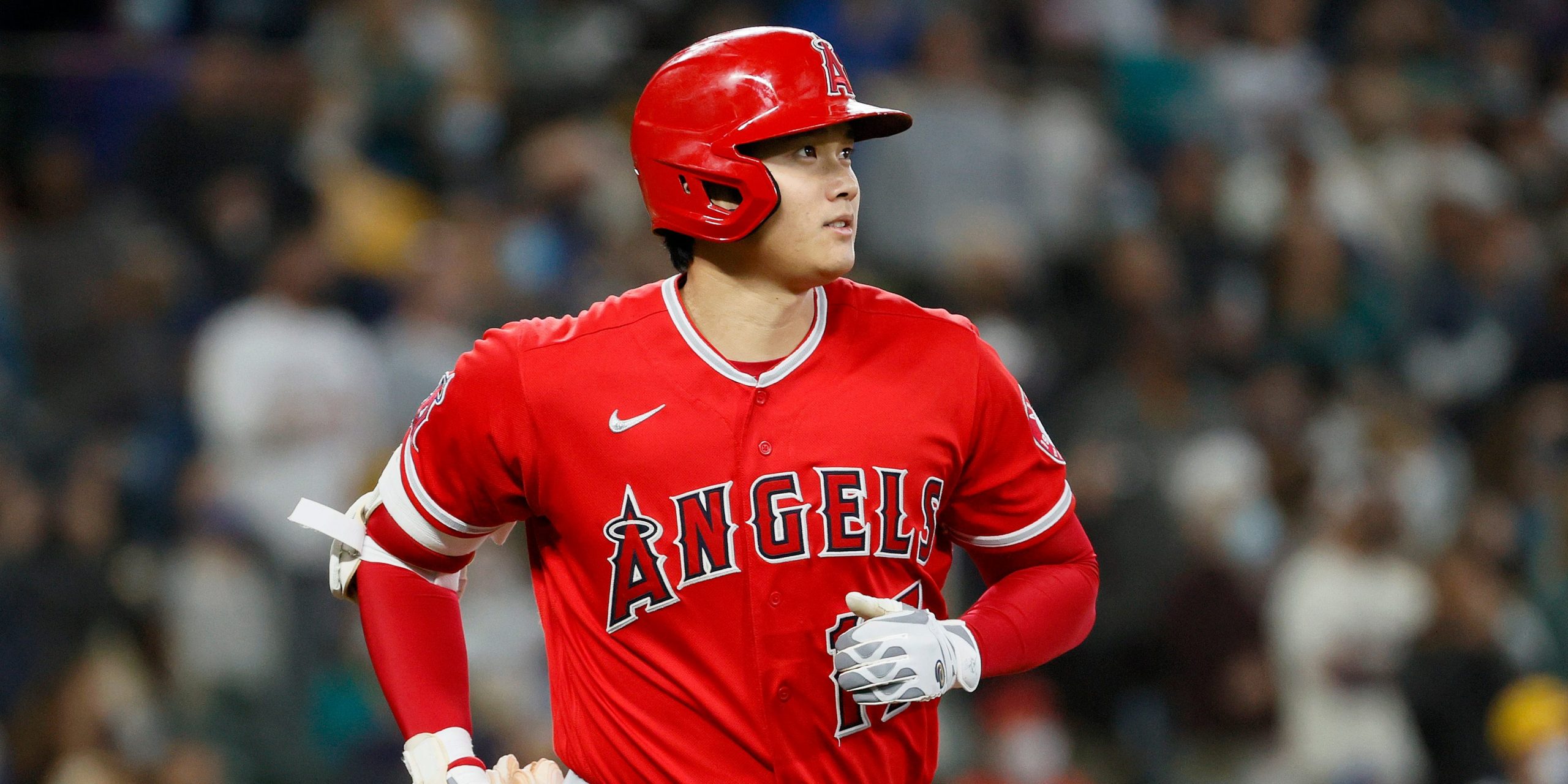 Shohei Ohtani of the Los Angeles Angels watches his home run against the Seattle Mariners during the first inning at T-Mobile Park on October 03, 2021 in Seattle, Washington.