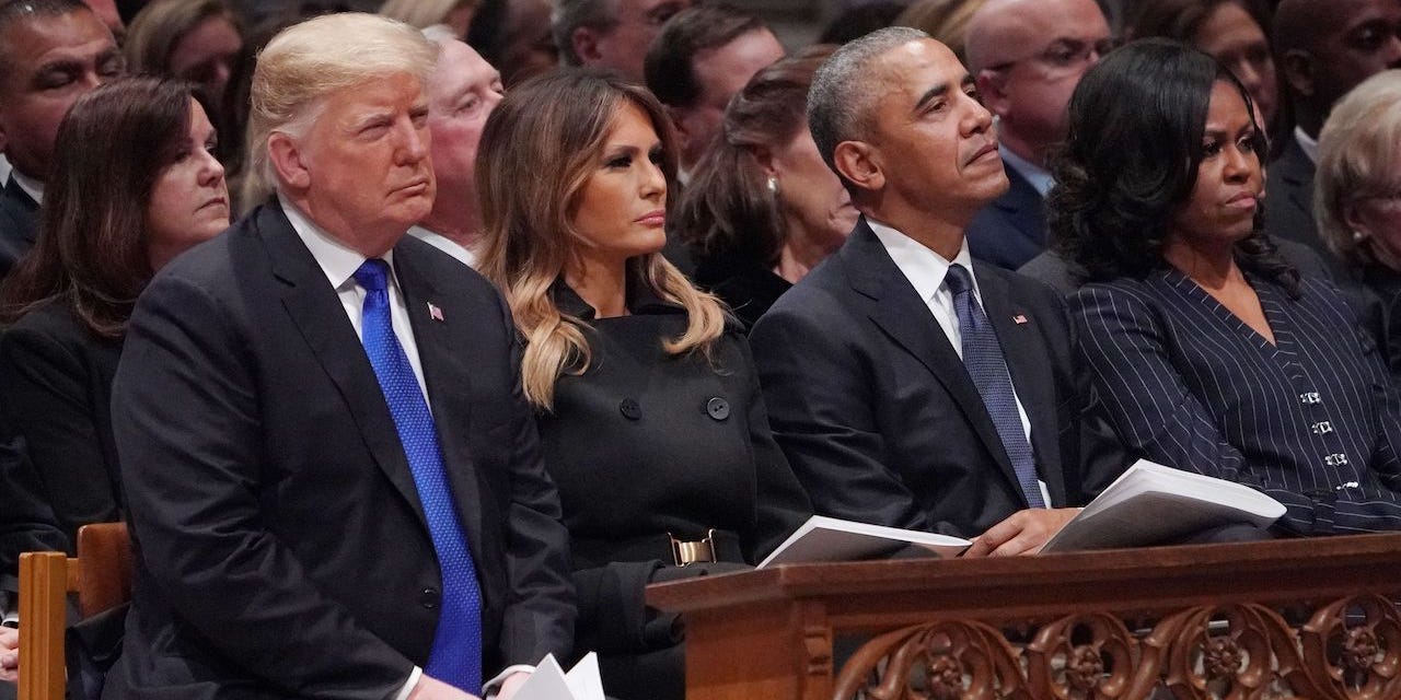 Former President Donald Trump, and First Lady Melania Trump, President Barack Obama and First Lady Michelle Obama attend the state funeral of former US president George H.W. Bush at the Washington National Cathedral in Washington, DC, December 5, 2018.