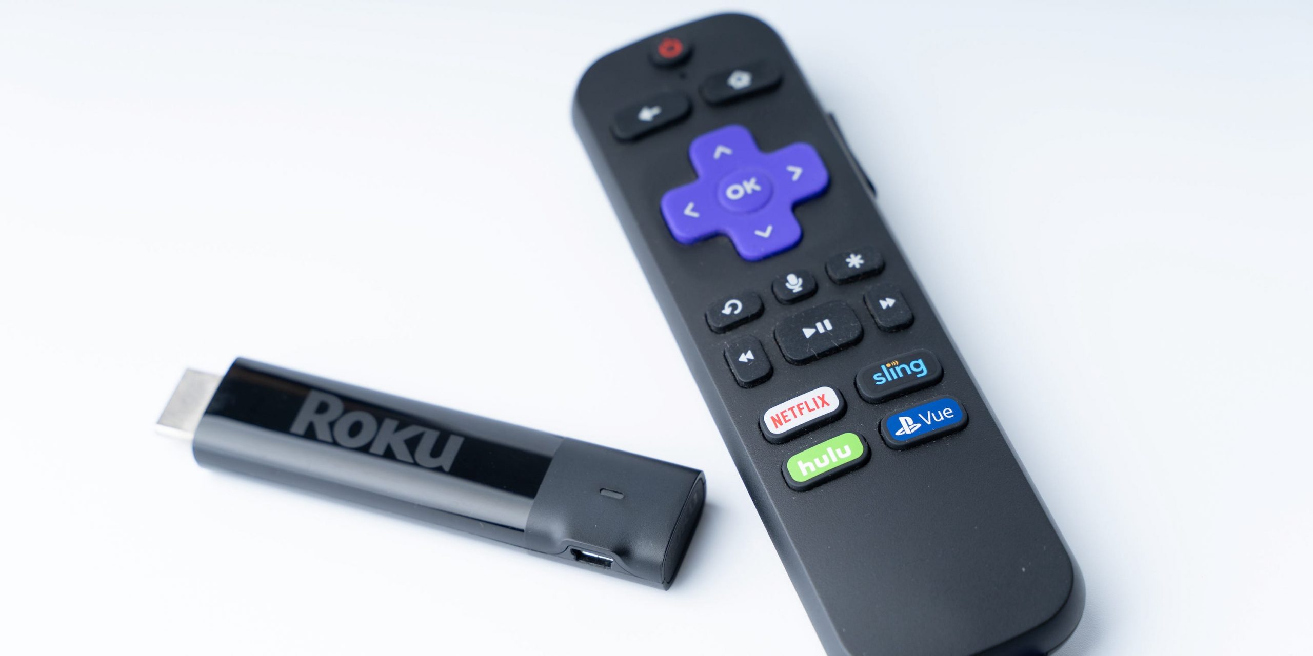 A Roku Streaming Stick and remote.