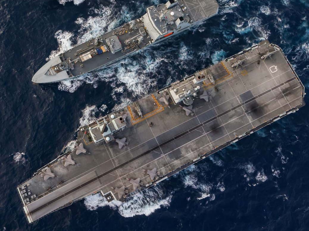 RFA Tidespring replenishment at sea with HMS Queen Elizabeth HNLMS Evertsen