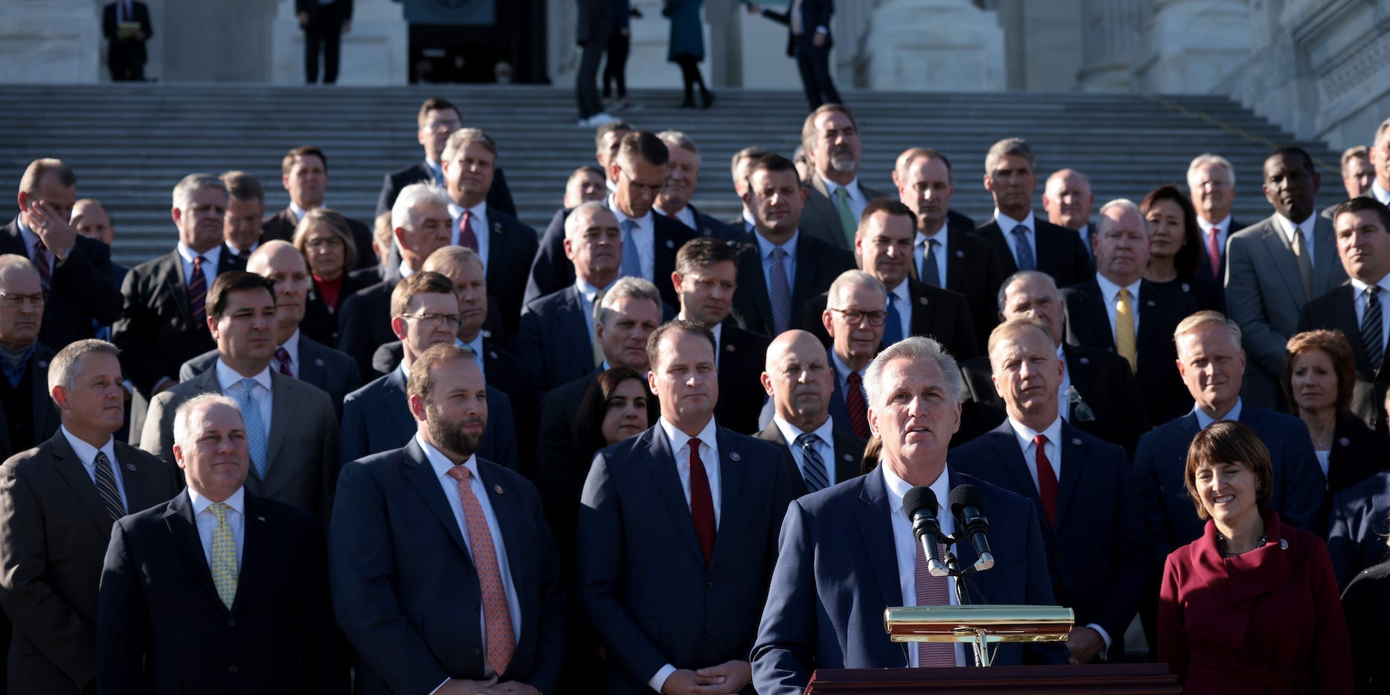 House Minority Leader Kevin McCarthy speaks with fellow Republicans on the House steps as the House debates censuring Rep. Paul Gosar on November 17, 2021 in Washington, DC.