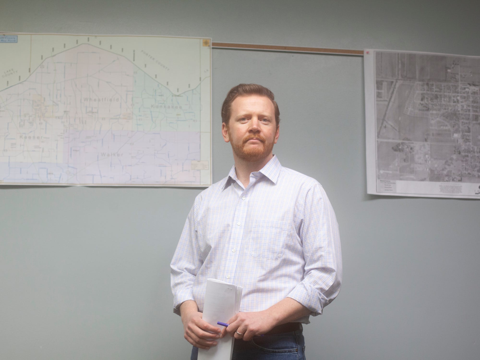 Mike Schmuhl stands inside Wheatfield, Indiana's town hall.