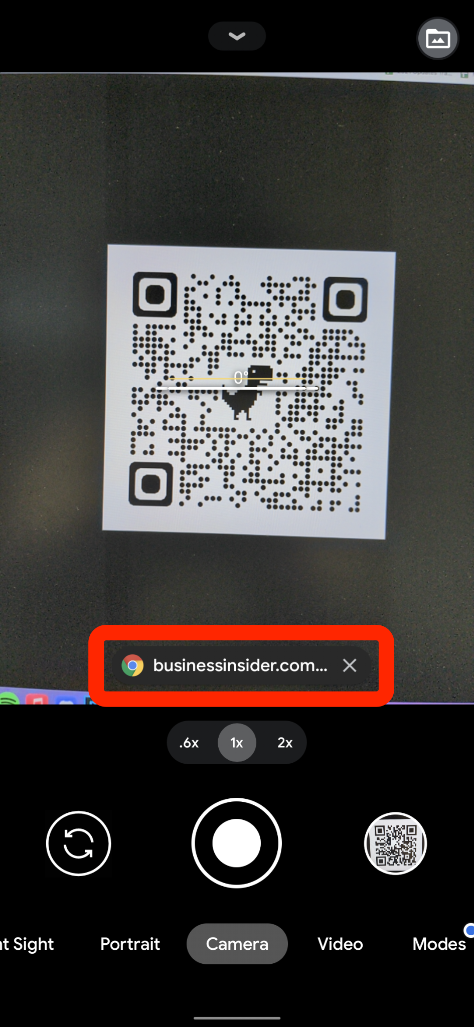 A QR code being scanned on an Android device. The URL that the code leads to is highlighted.