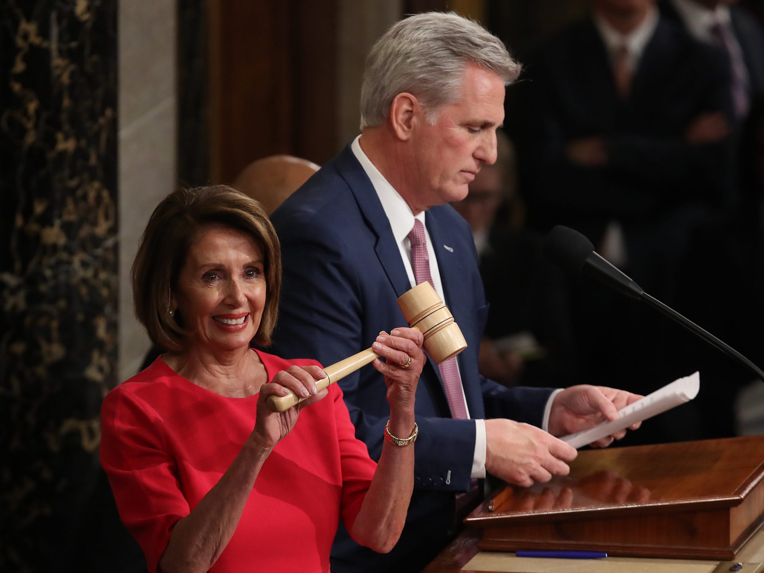 Pelosi holds gavel next to Kevin McCarthy