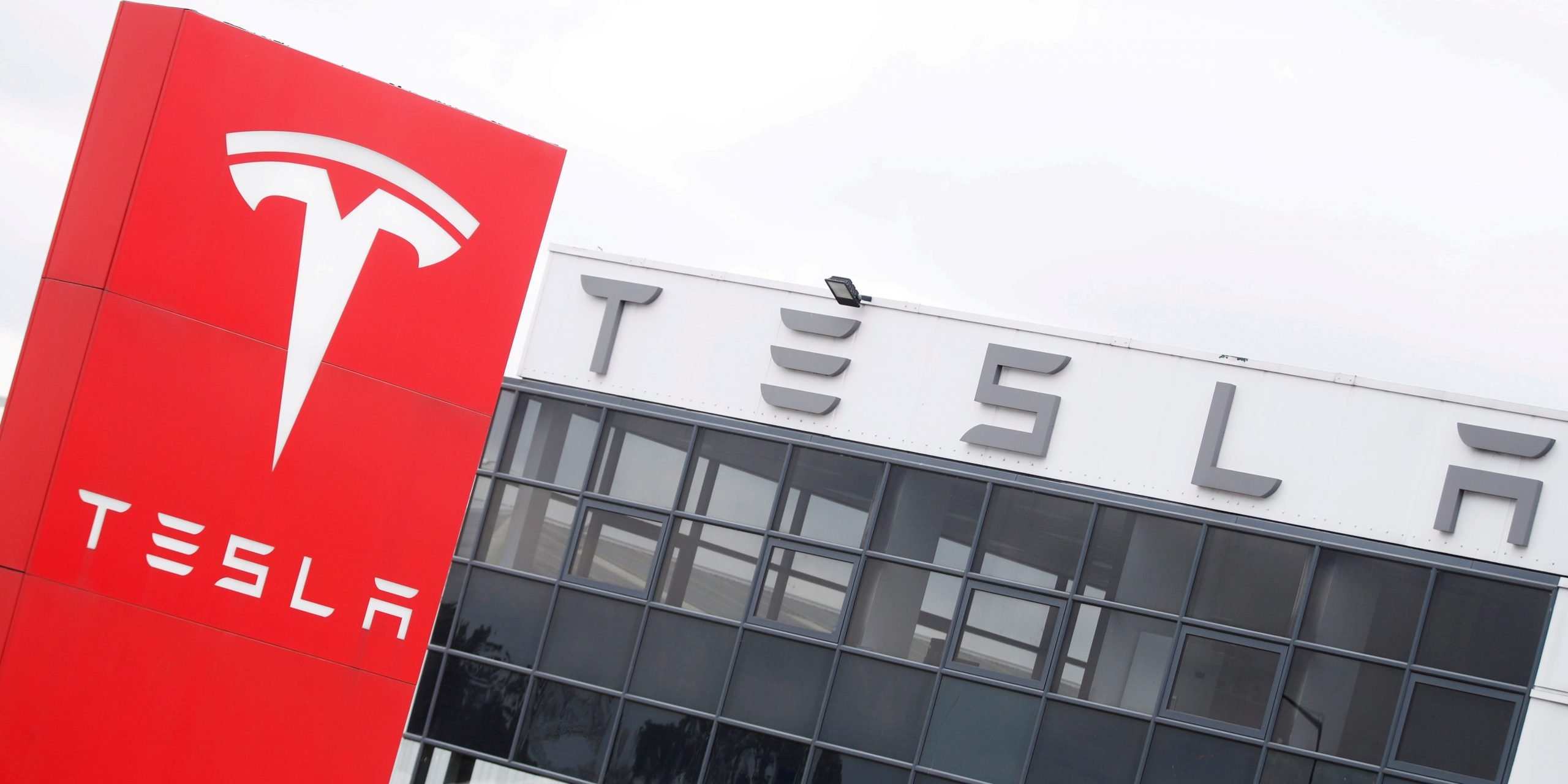 The logo of car manufacturer Tesla is seen at a dealership in London, Britain, May 14, 2021.