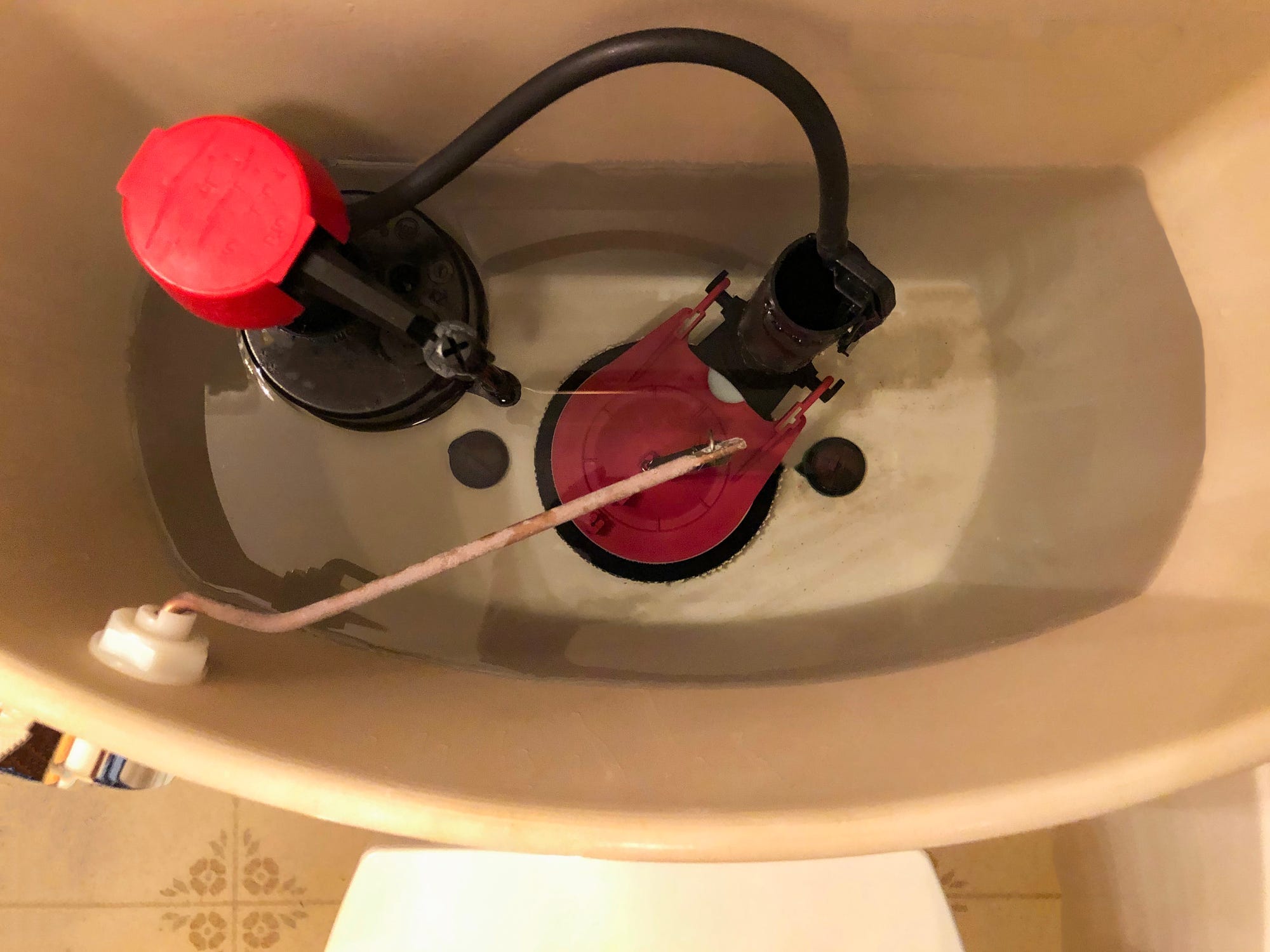 The inner workings of a toilet tank