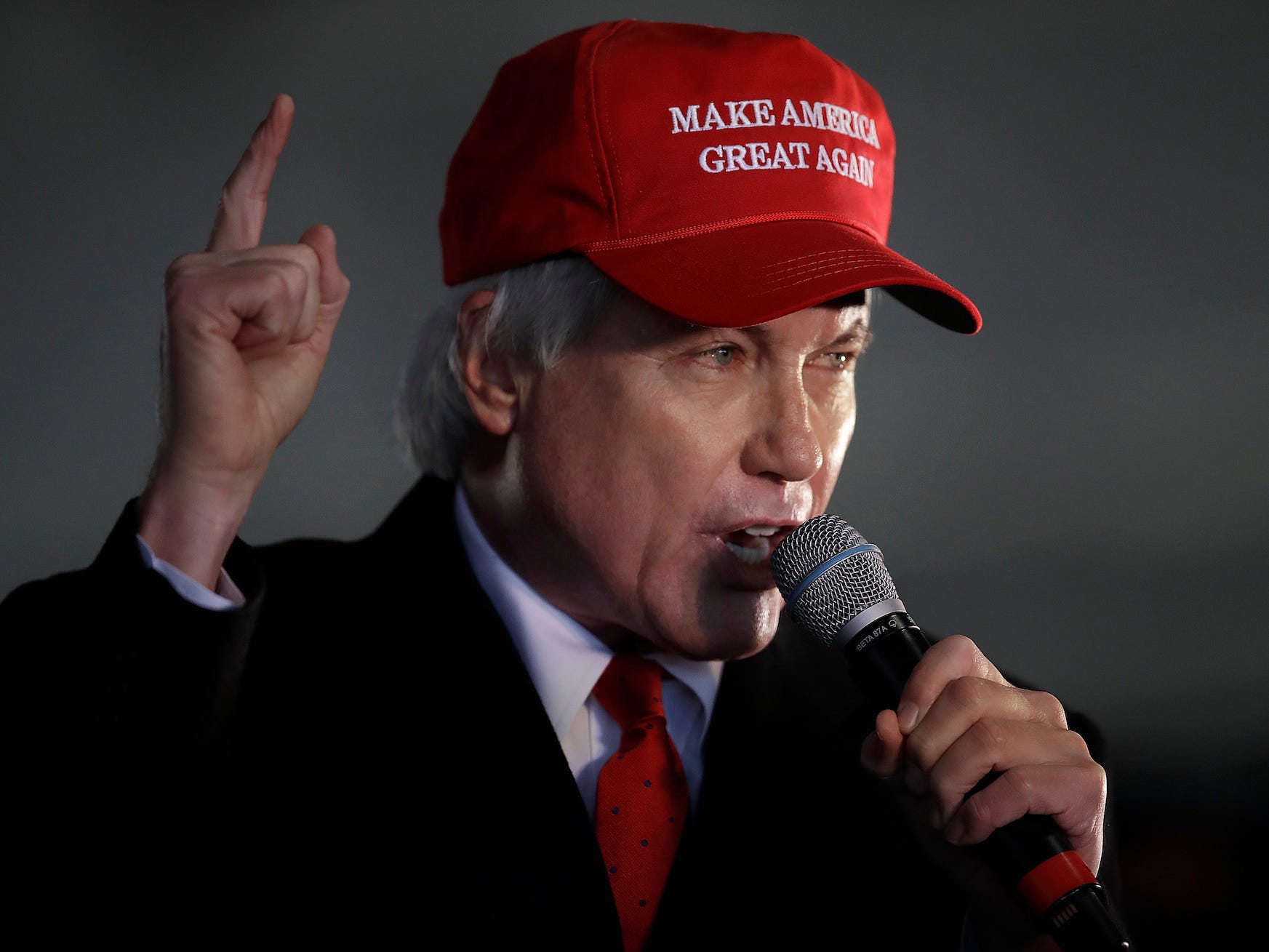 Attorney Lin Wood, a member of President Donald Trump's legal team, gestures while speaking during a rally on Dec. 2, 2020, in Alpharetta, Ga.