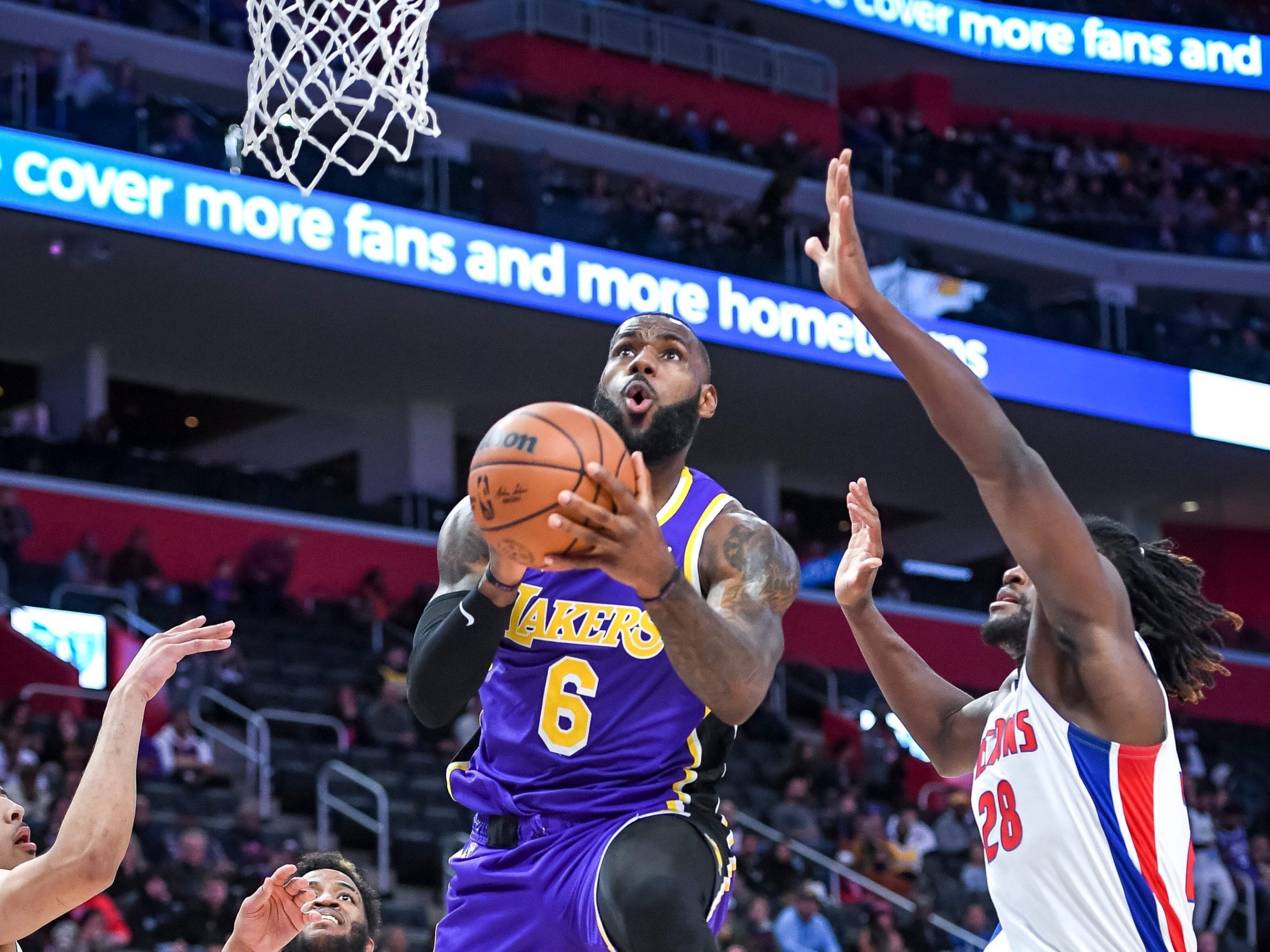 LeBron James of the Los Angeles Lakers shoots the ball against Isaiah Stewart