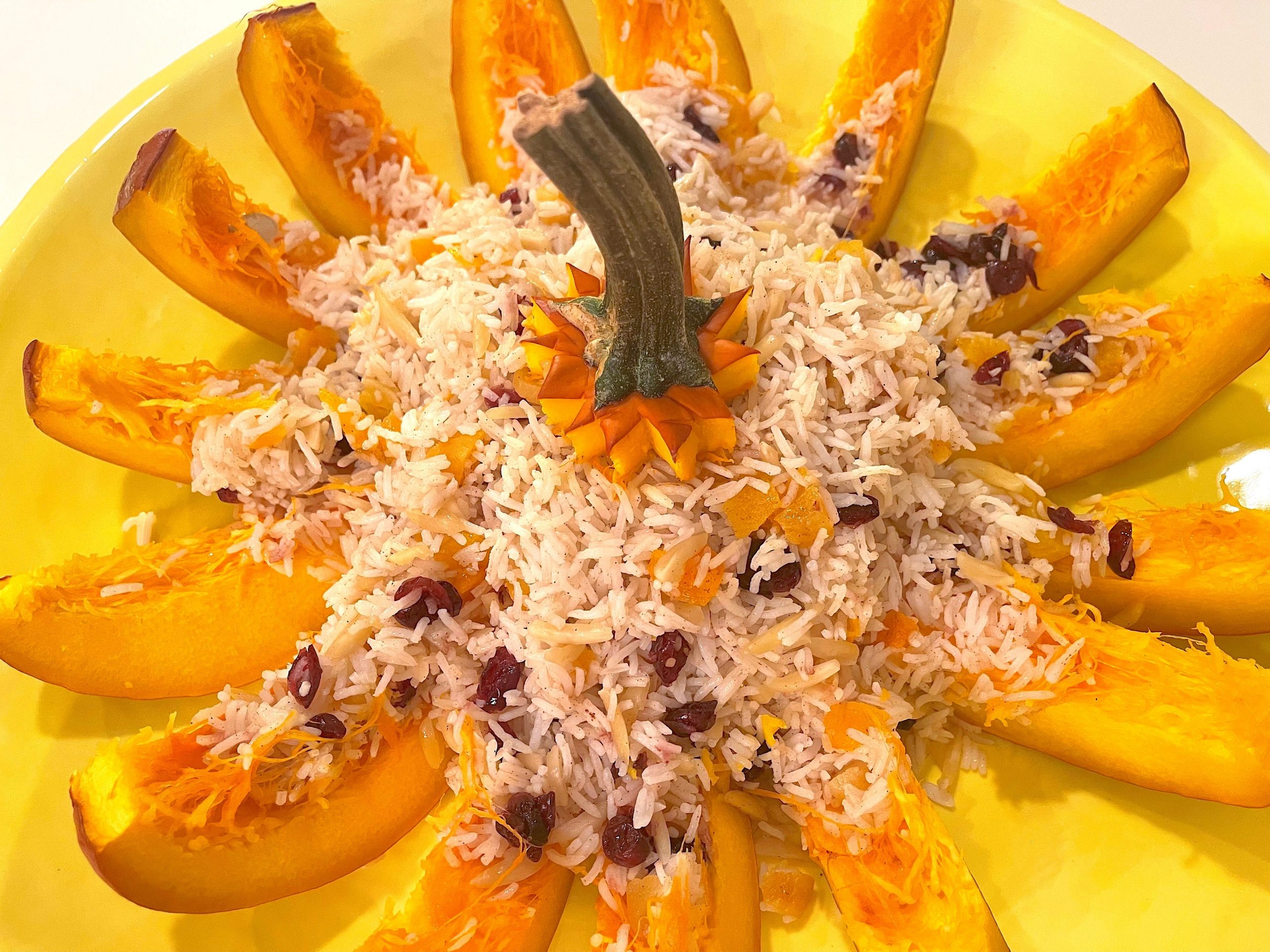 A stuffed pumpkin cut into wedges.