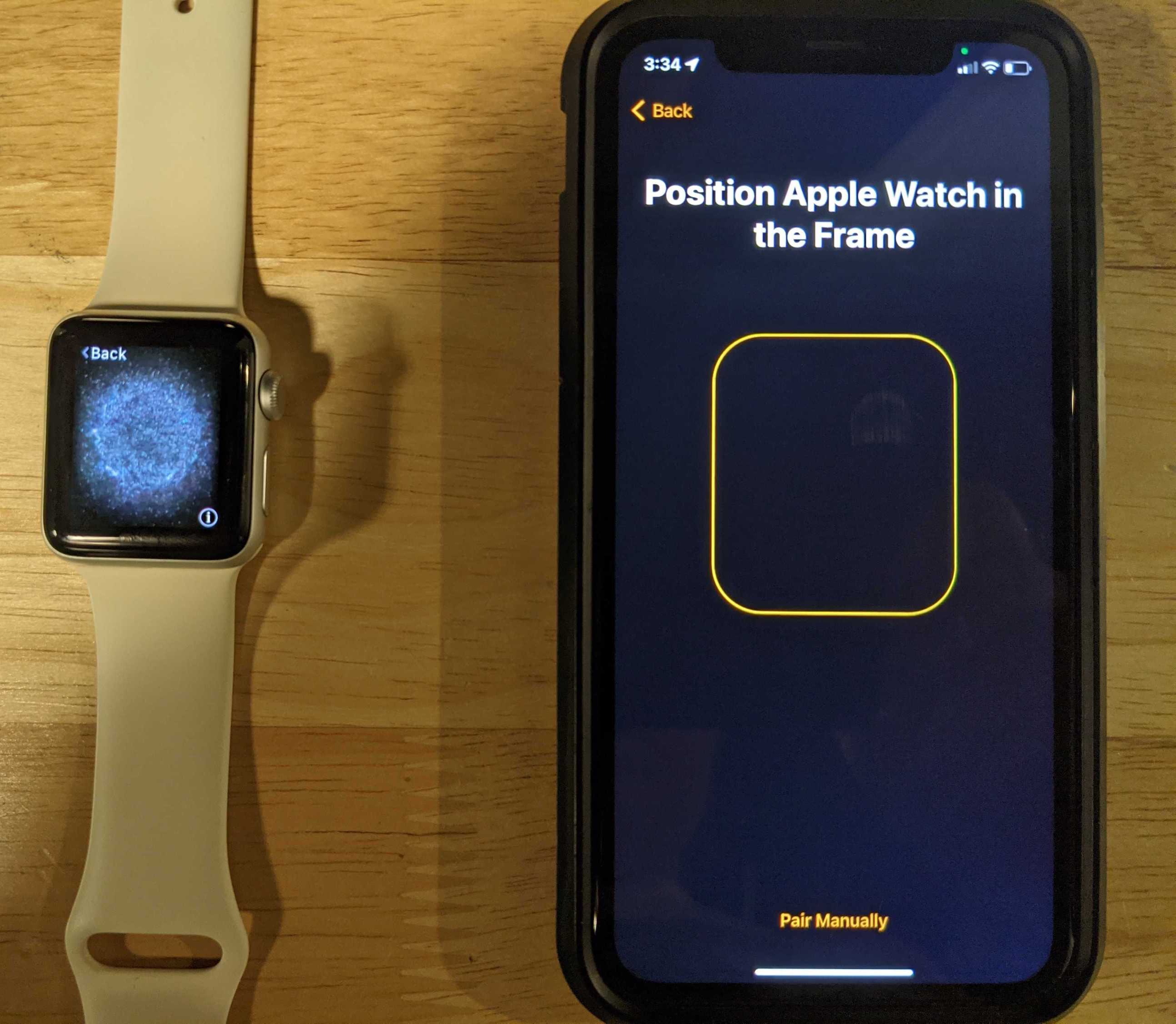 An Apple Watch and iPhone getting ready to pair.