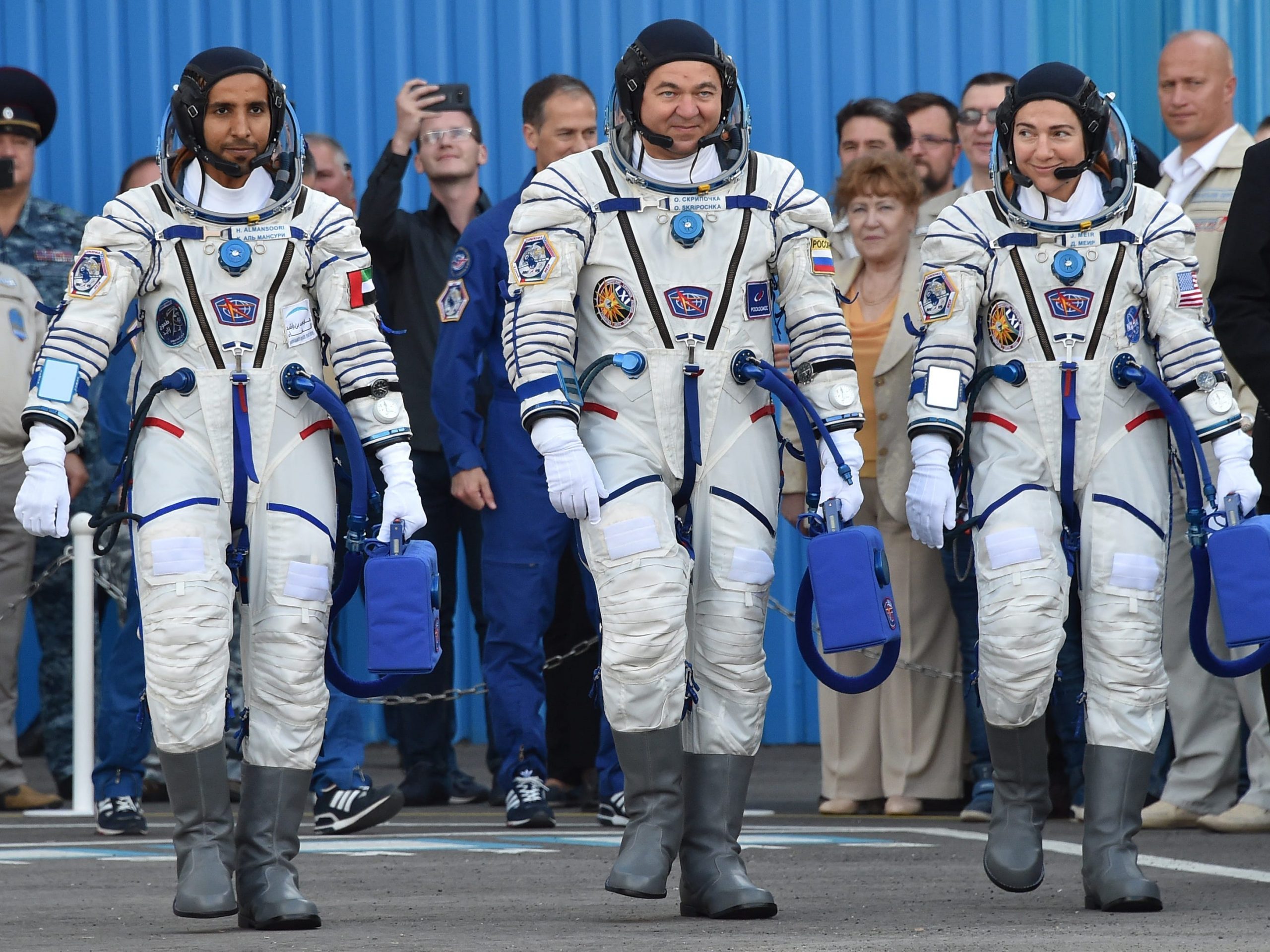 astronaut Hazzaa al-Mansoori, Russian cosmonaut Oleg Skripochka and US astronaut Jessica Meir report