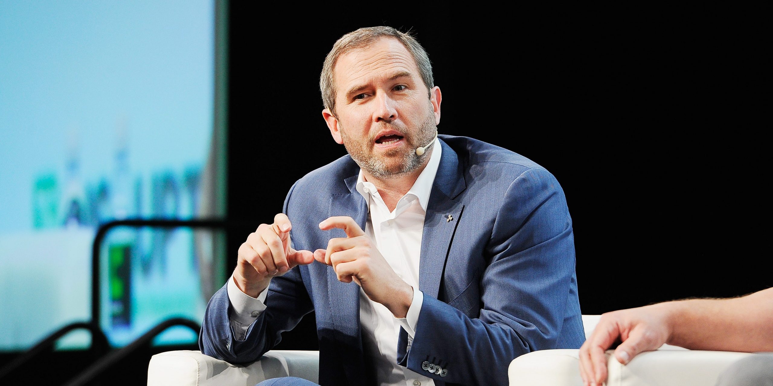 Ripple CEO Brad Garlinghouse speaks onstage at the Moscone Center in San Francisco.