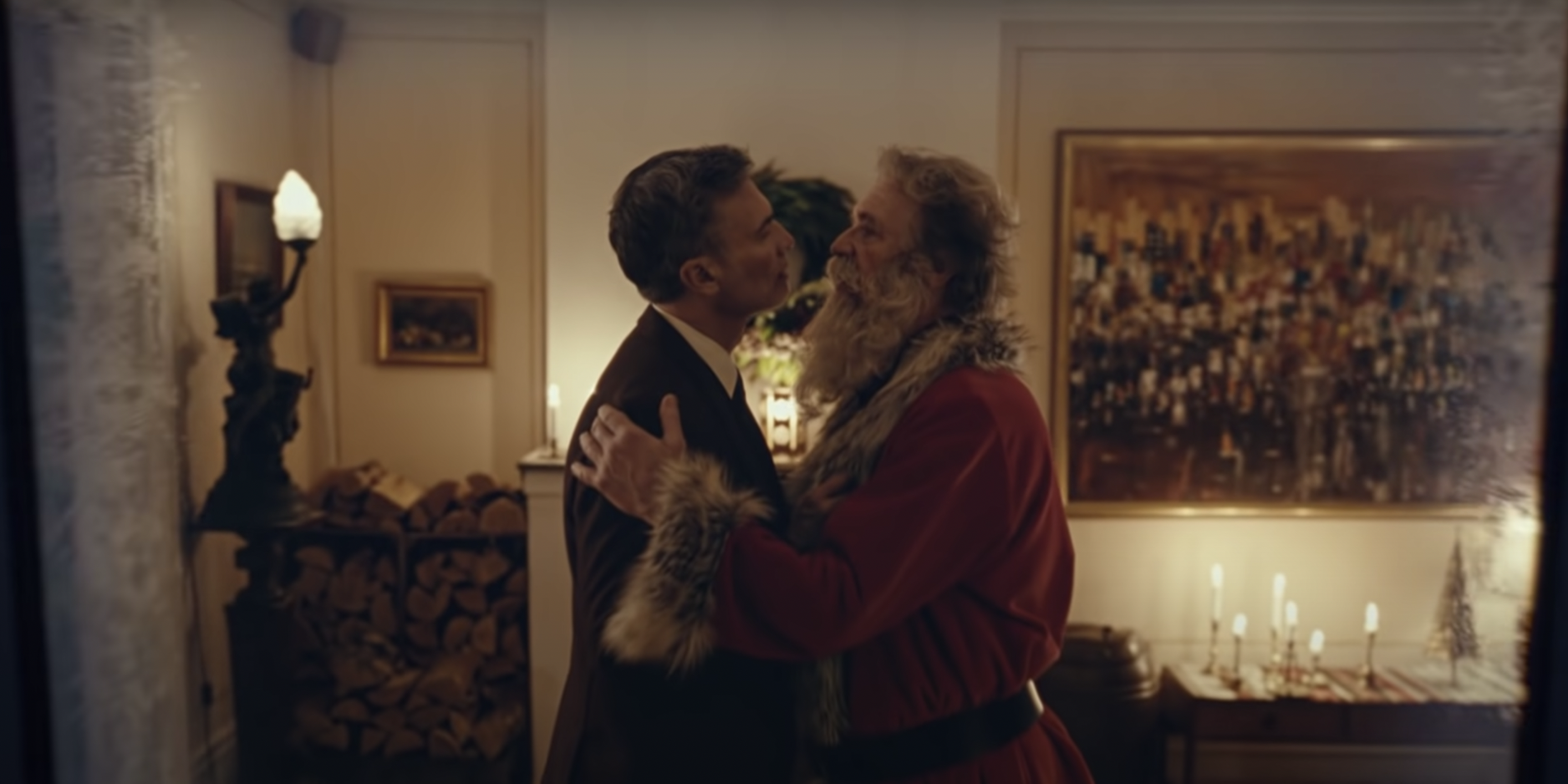 Santa and Harry embrace.