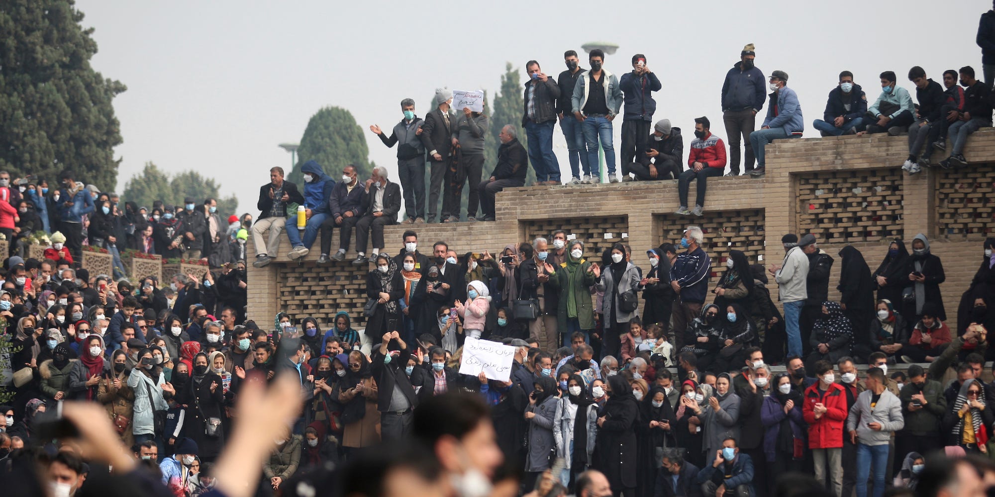 In this photo released by the semi-official Fars News Agency, farmers attend a protest demanding authorities open a dam to relieve drought-stricken areas of central province of Isfahan, on the dried up riverbed of the Zayandeh Roud river in the city of Isfahan 255 miles (410 kilometers) south of the capital Tehran, Iran, Friday, Nov. 19, 2021.