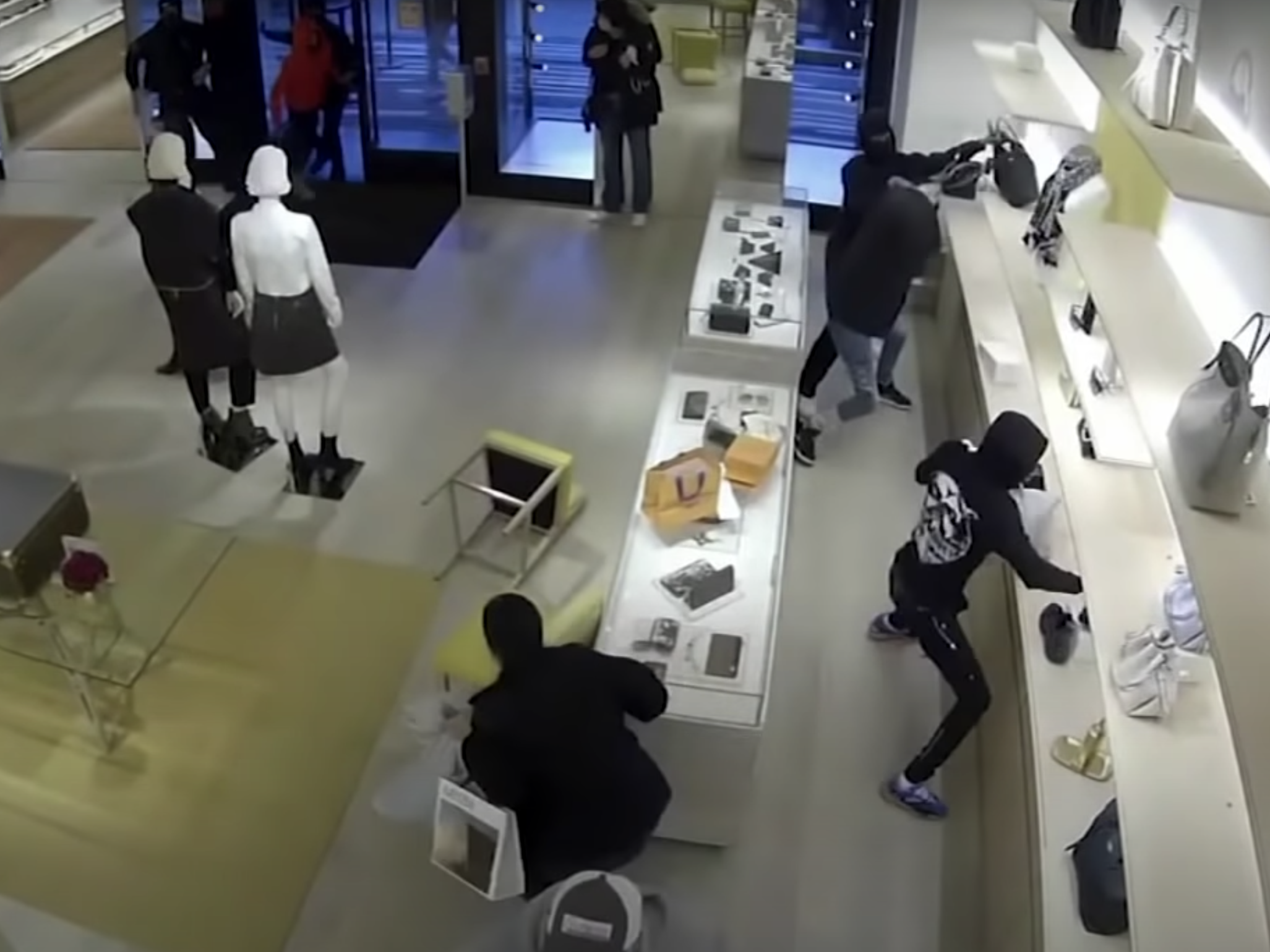 Robbers in a Louis Vuitton store in Chicago.