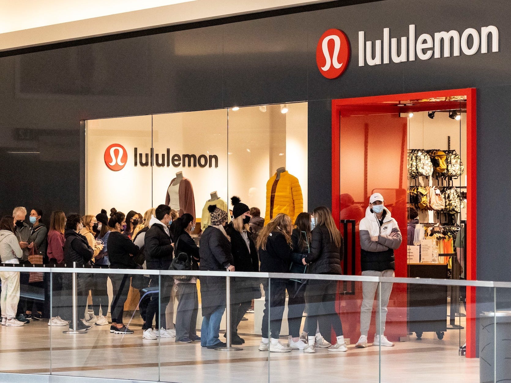 Shoppers line up outside a Lululemon store in Chicago on Black Friday.