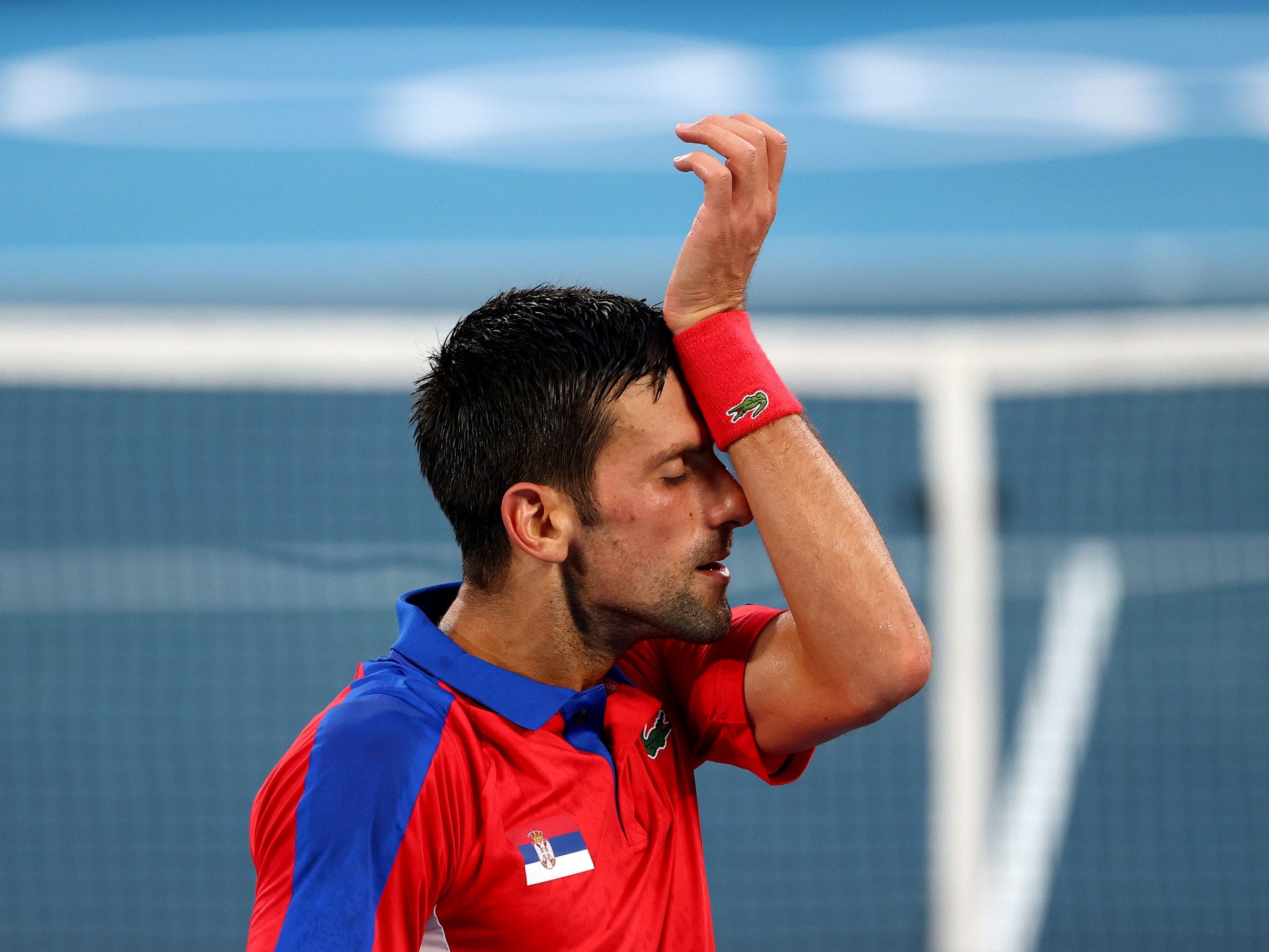 Novak Djokovic reacts at Tokyo 2020.