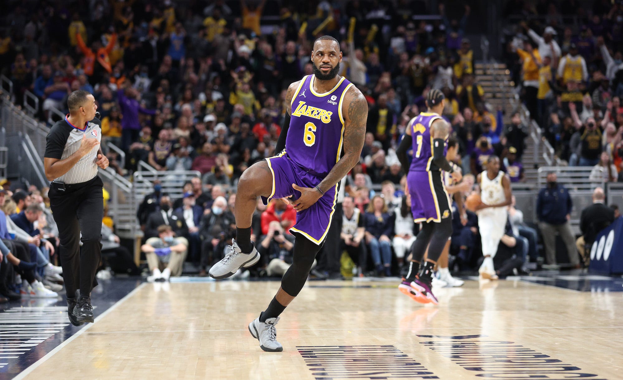 LeBron James #6 of the Los Angeles Lakers celebrates in the 124-116 OT win against the Indiana Pacers at Gainbridge Fieldhouse