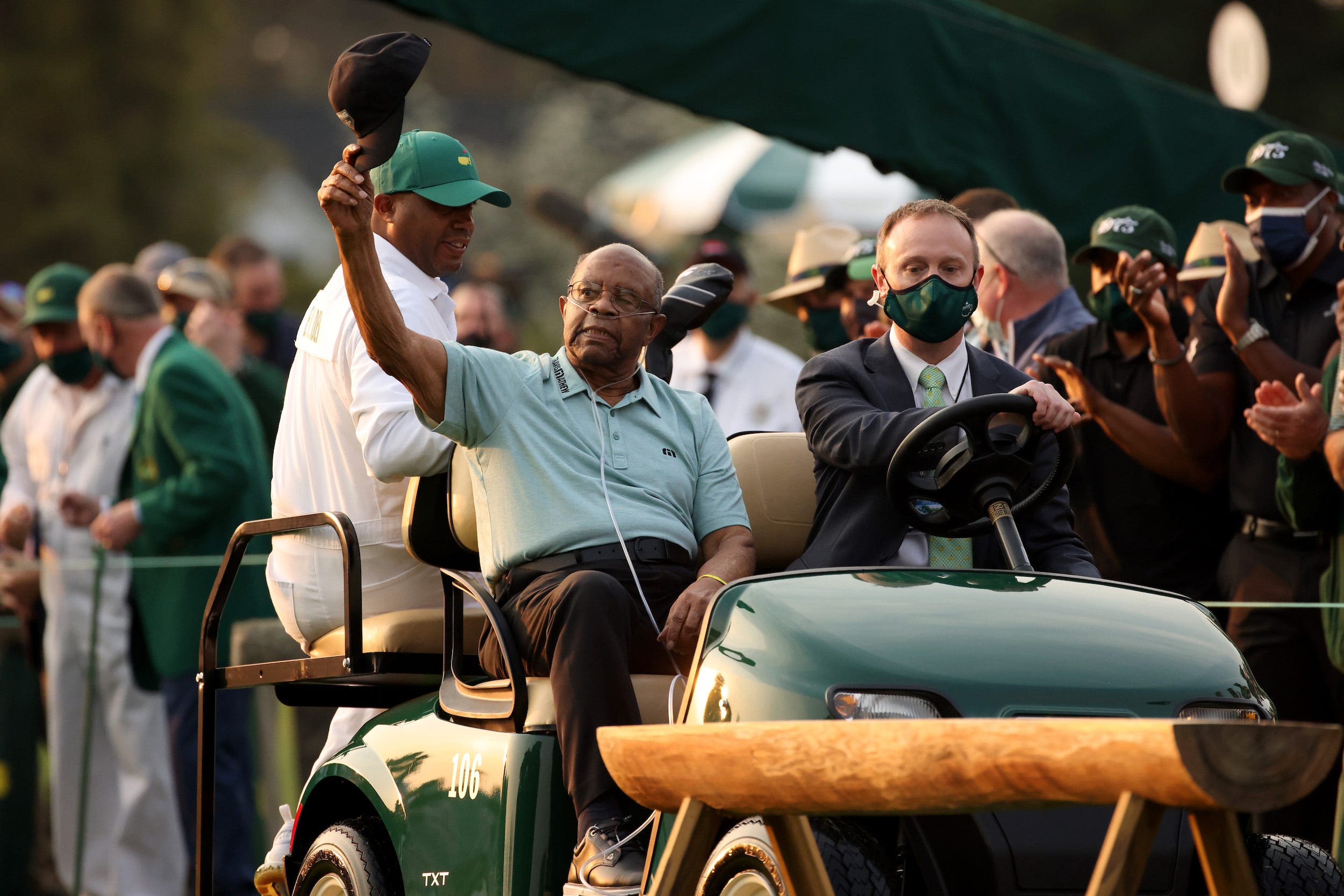 onorary Starter Lee Elder of the United States waves to the patrons as he arrives to the opening ceremony prior to the start of the first round of the Masters at Augusta National Golf Club on April 08, 2021 in Augusta, Georgia.