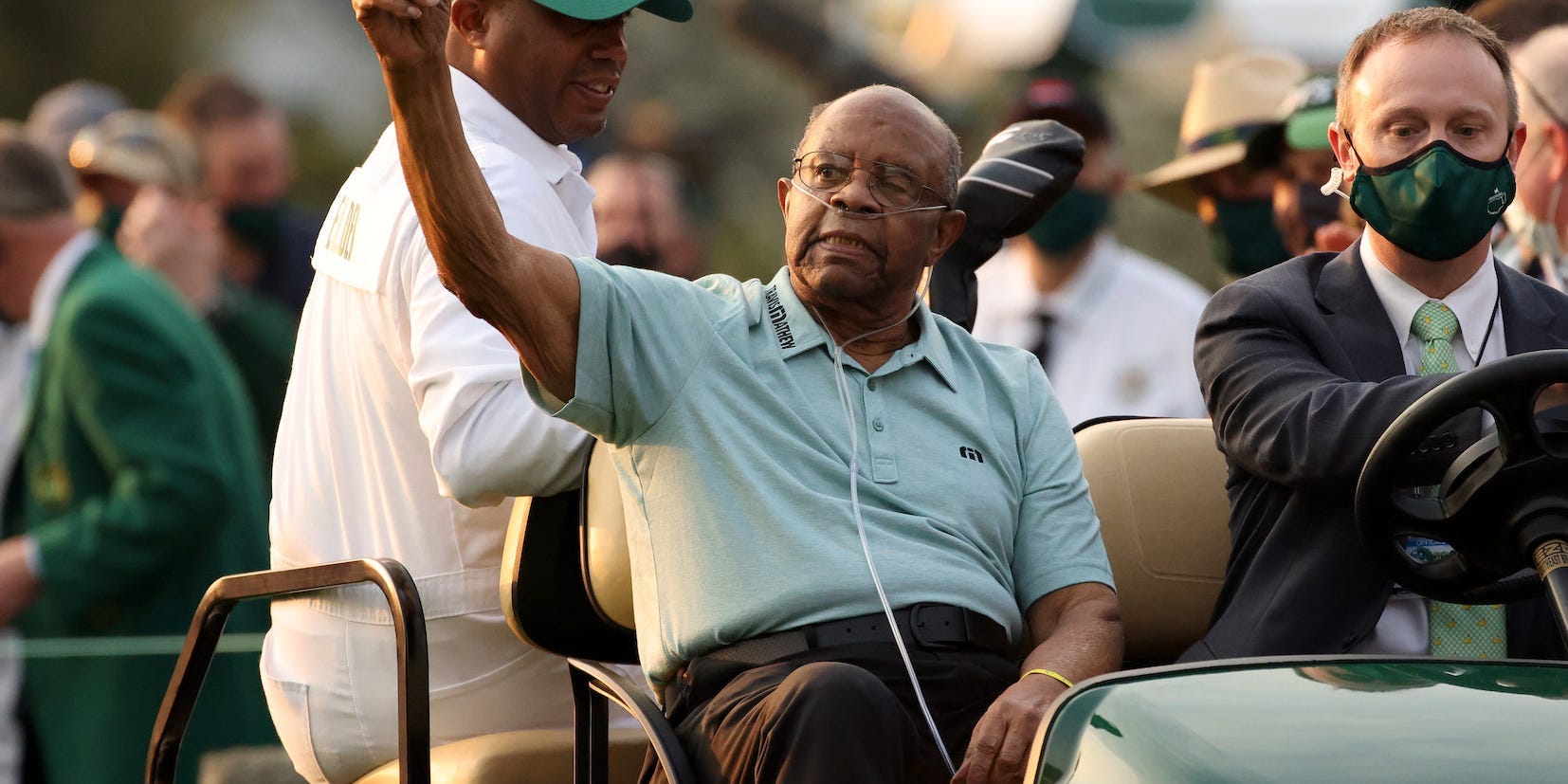 onorary Starter Lee Elder of the United States waves to the patrons as he arrives to the opening ceremony prior to the start of the first round of the Masters at Augusta National Golf Club on April 08, 2021 in Augusta, Georgia.