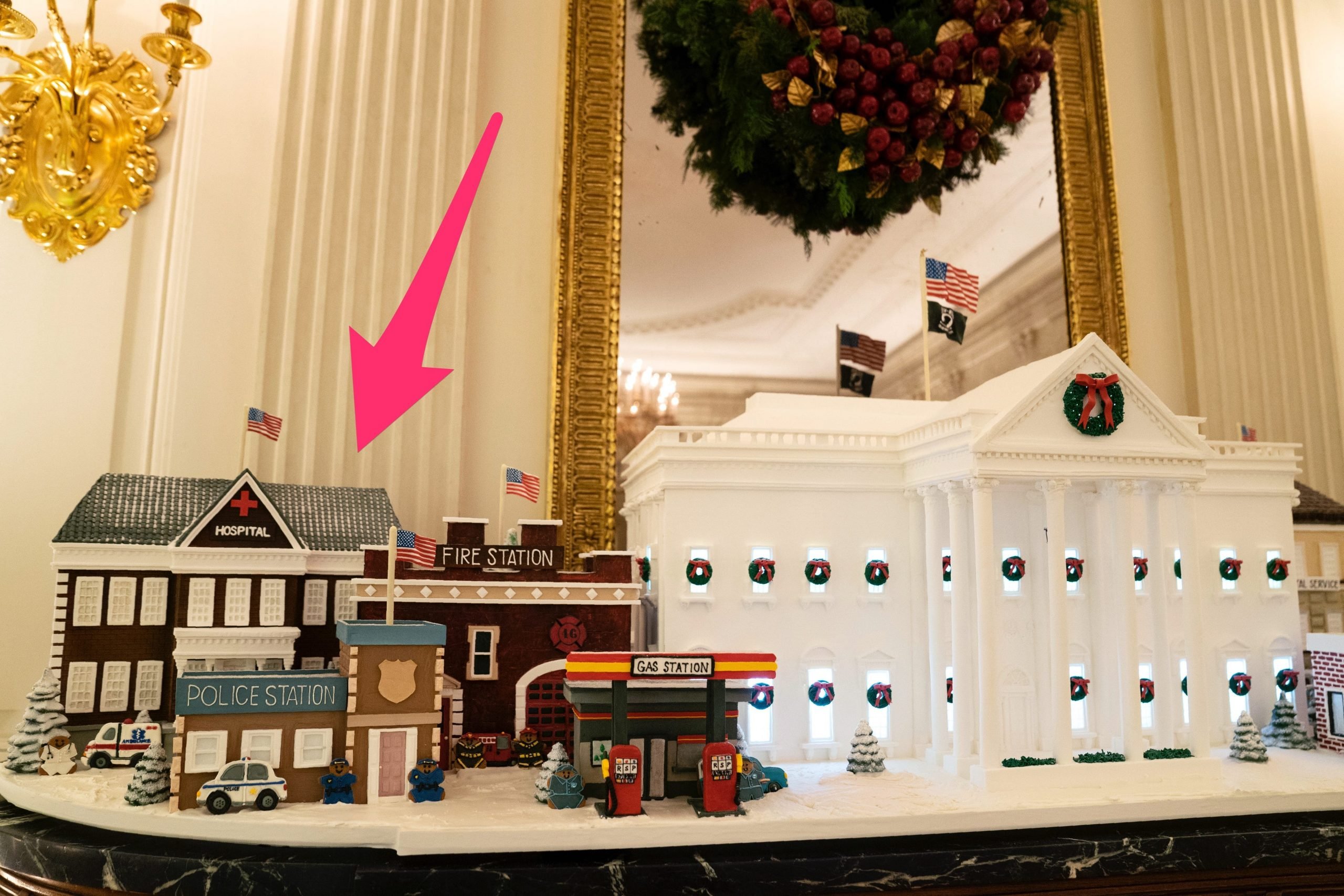 Gingerbread buildings honoring frontline workers next to the official White House Gingerbread House.
