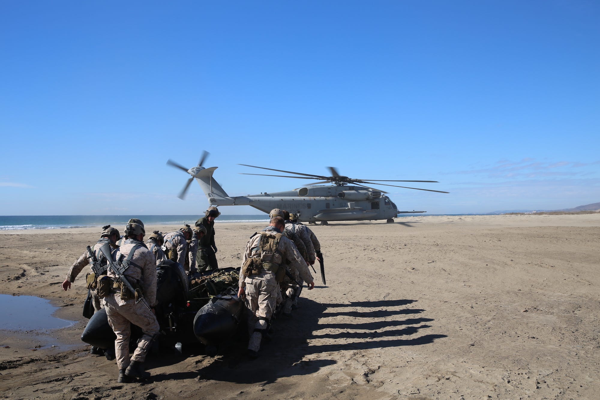 US Marines with combat rubber raiding craft for helocast