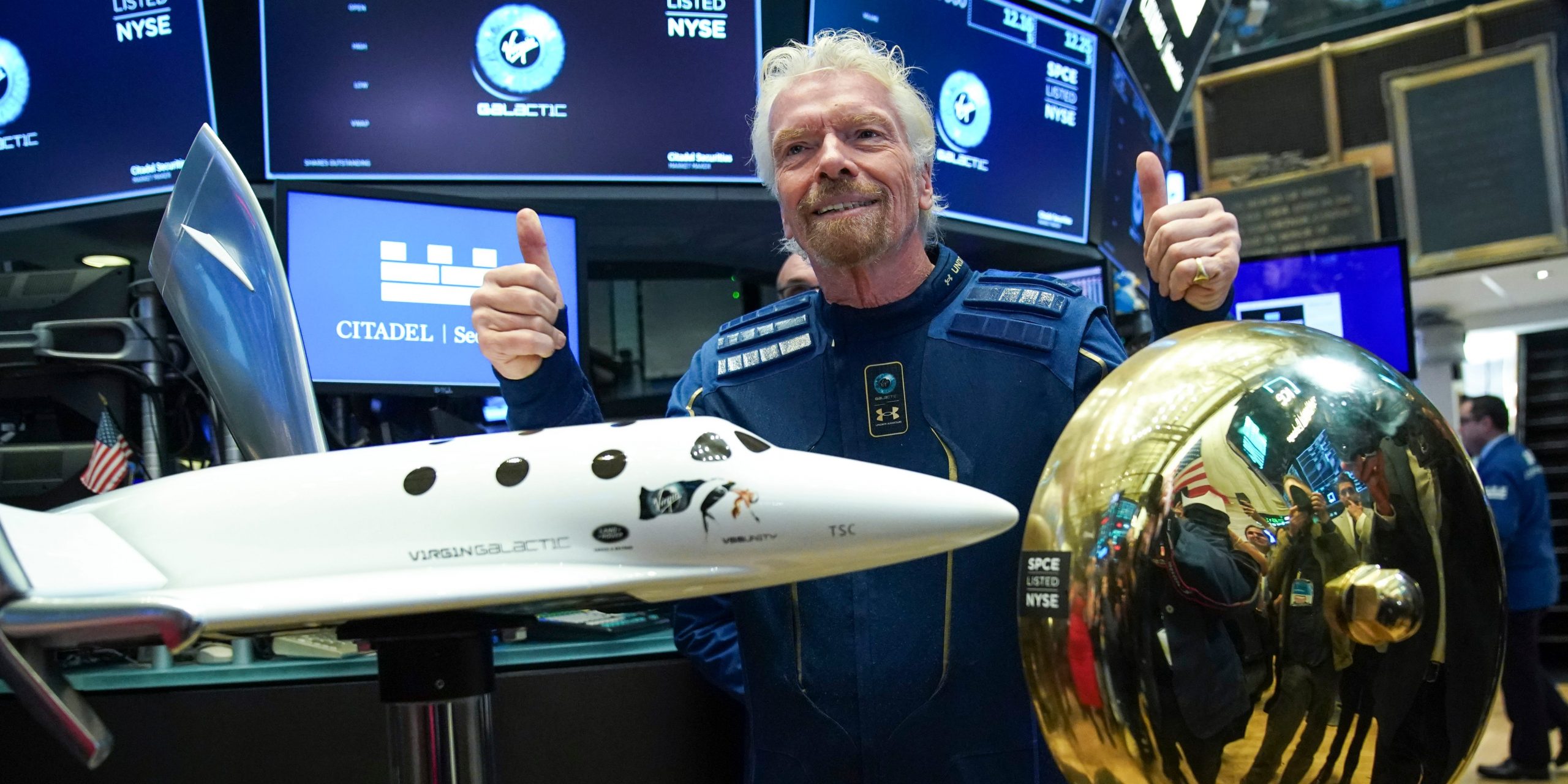 Sir Richard Branson, Founder of Virgin Galactic, poses for photographs before ringing a ceremonial bell on the floor of the New York Stock Exchange (NYSE) to promote the first day of trading of Virgin Galactic Holdings shares on October 28, 2019 in New York City.