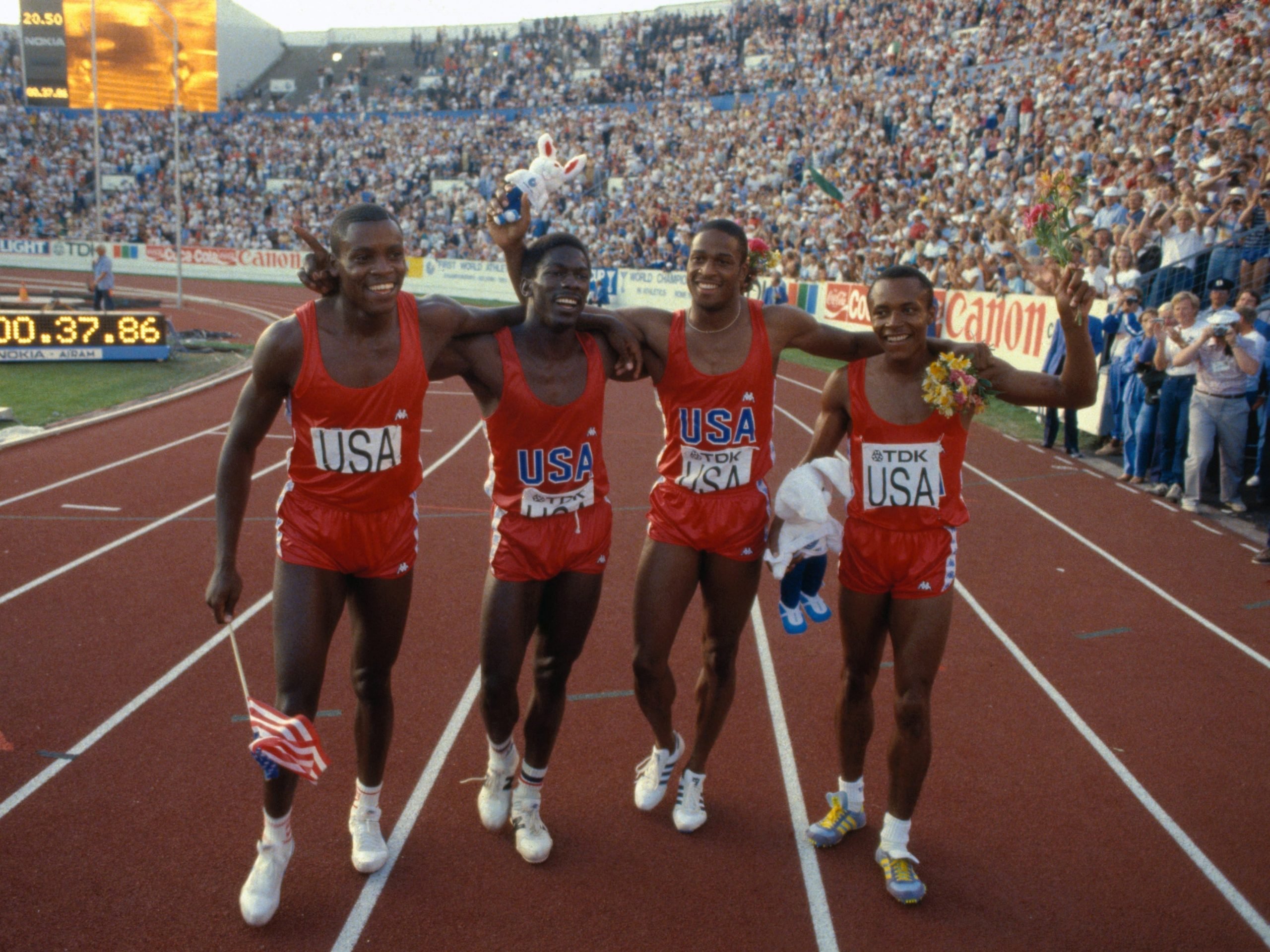 The world record-setting American team of (L-R), Carl Lewis, Emmit King, Willie Gault, and Calvin Smith