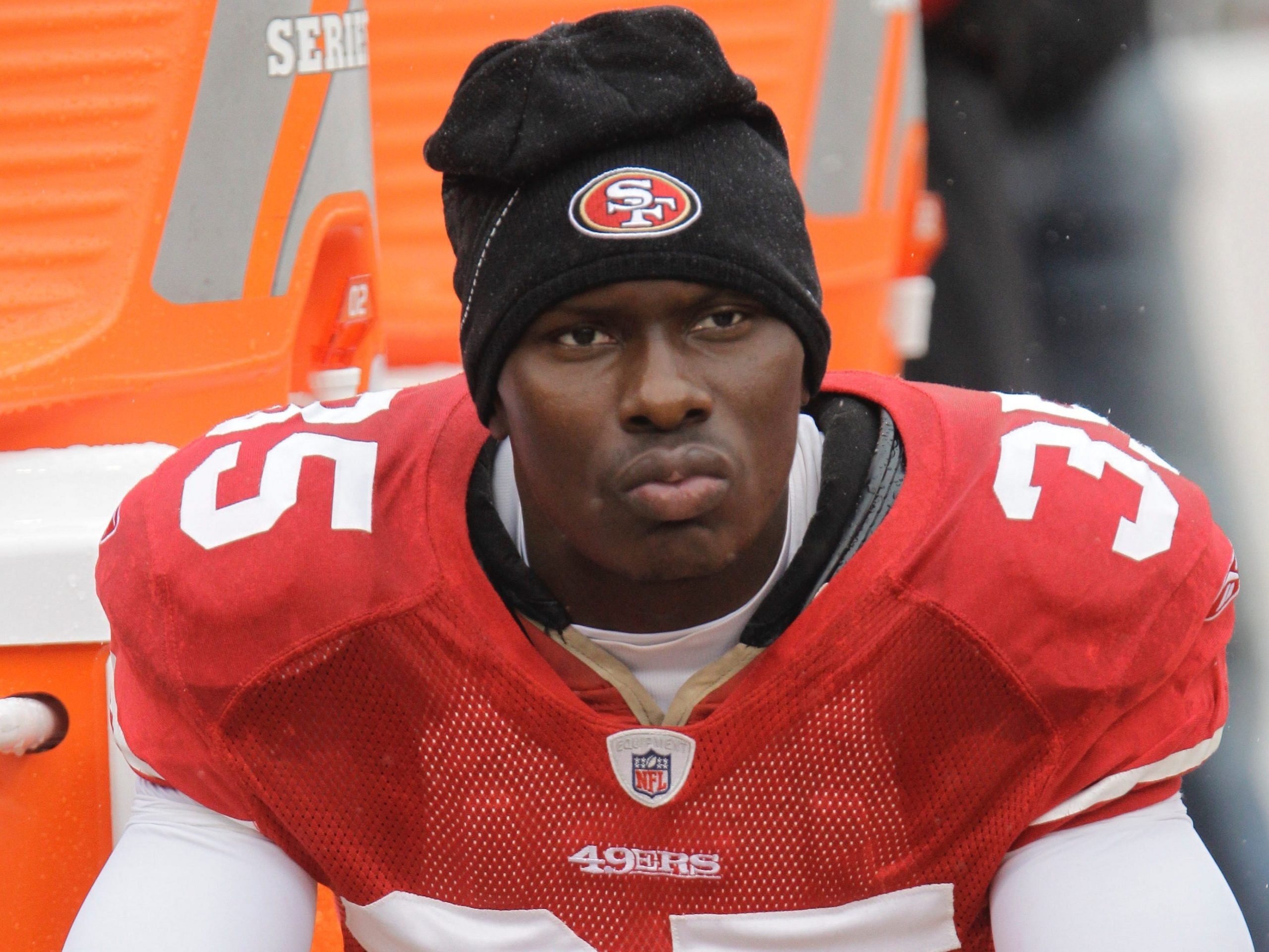 In this Oct. 17, 2010 file photo, San Francisco 49ers cornerback Phillip Adams (35) sits on the sideline during the first quarter of an NFL football game in San Francisco.