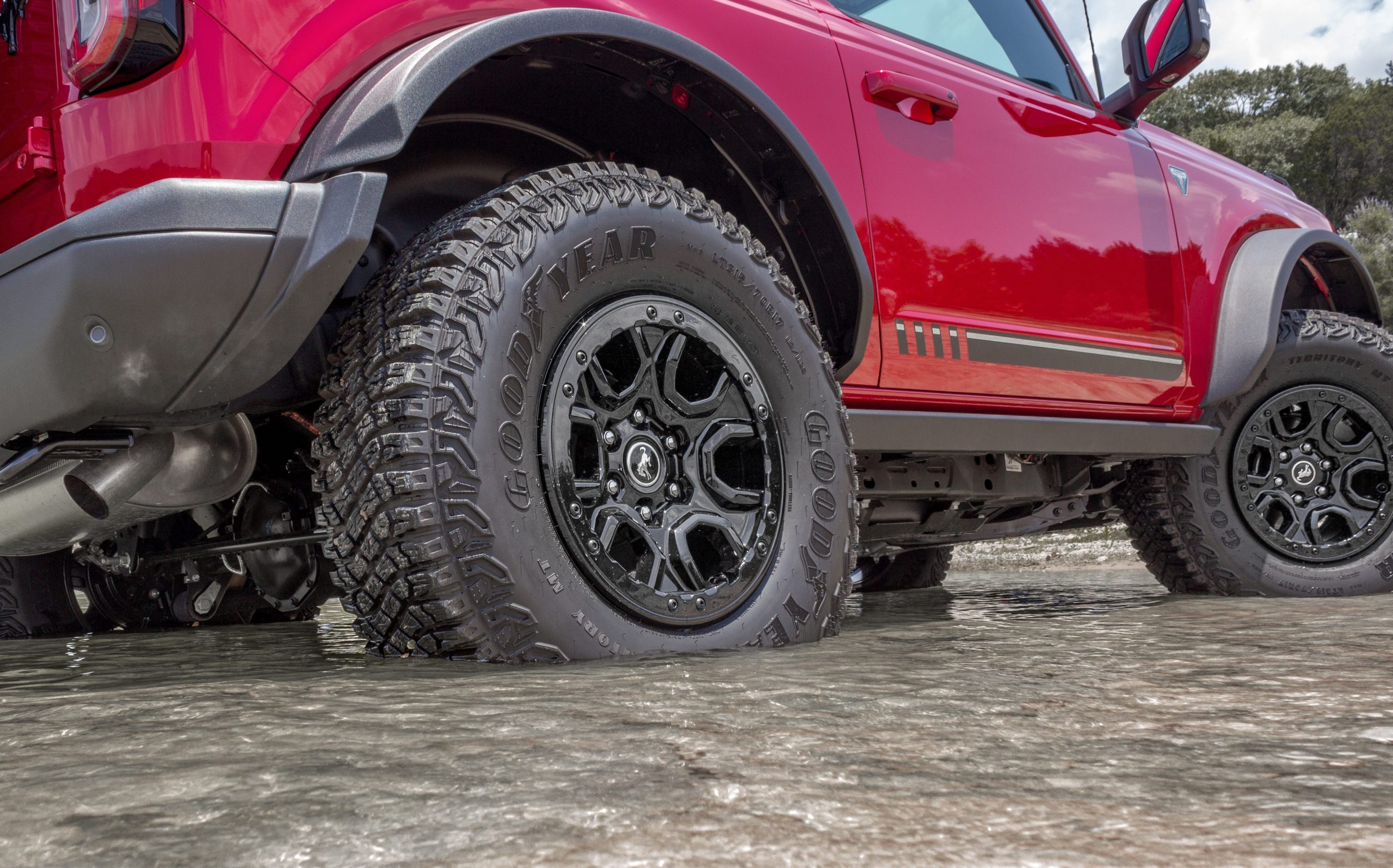 The Ford Bronco in a lake.