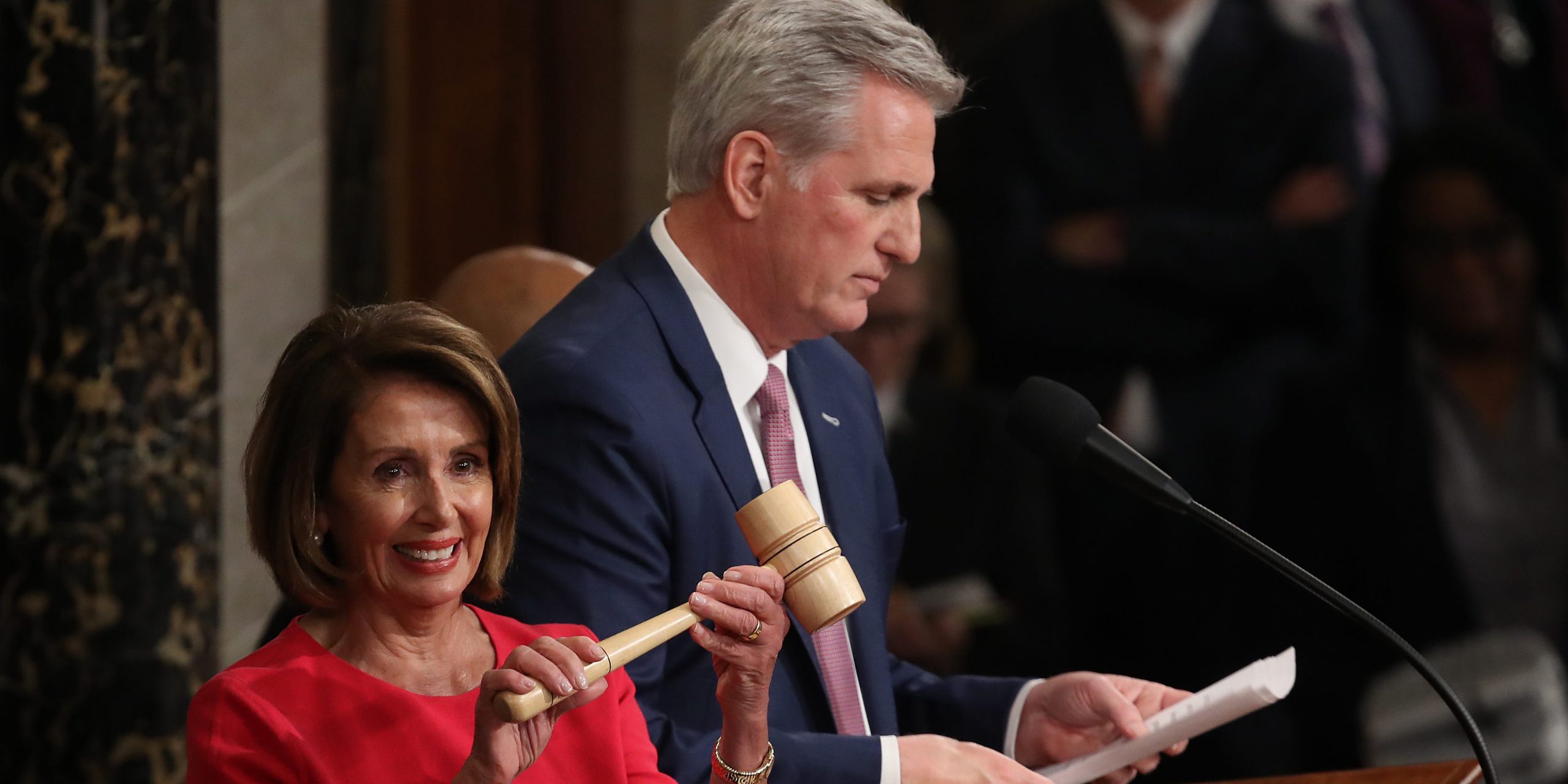 Pelosi holds gavel next to Kevin McCarthy