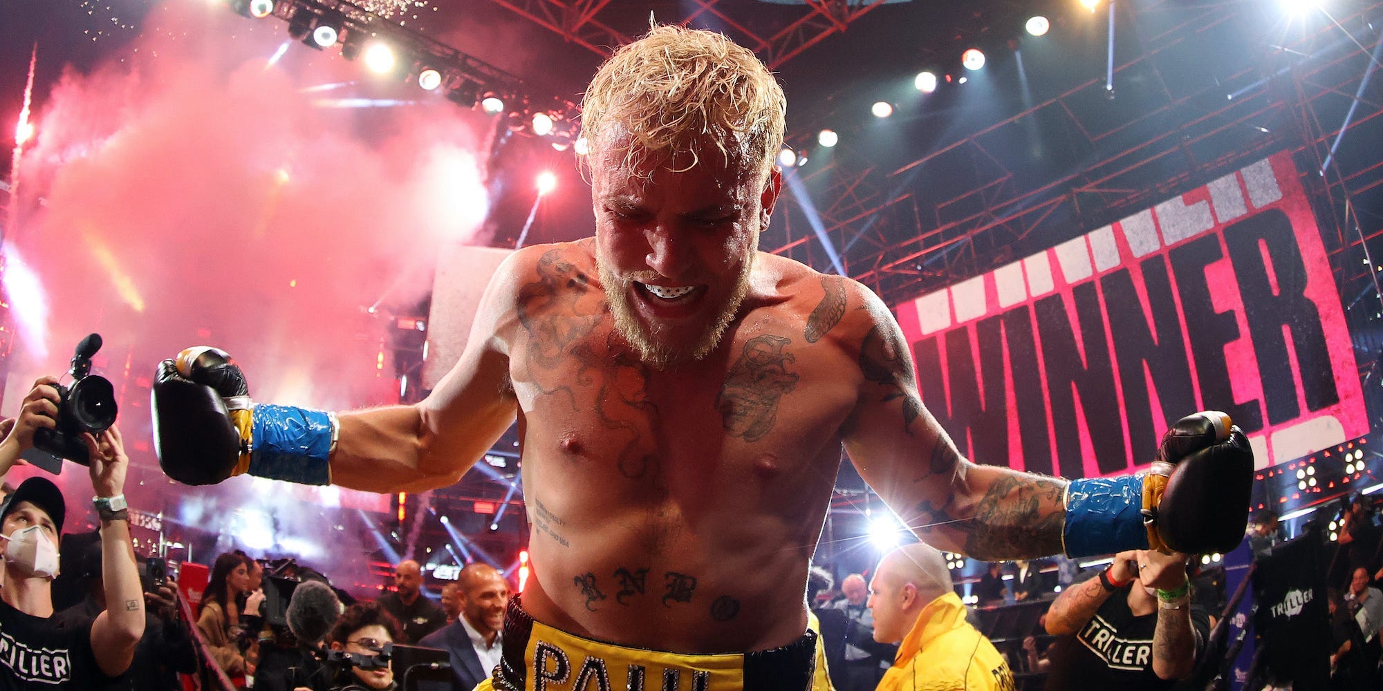 Jake Paul celebrates his latest win — a stunning knockout over Ben Askren.