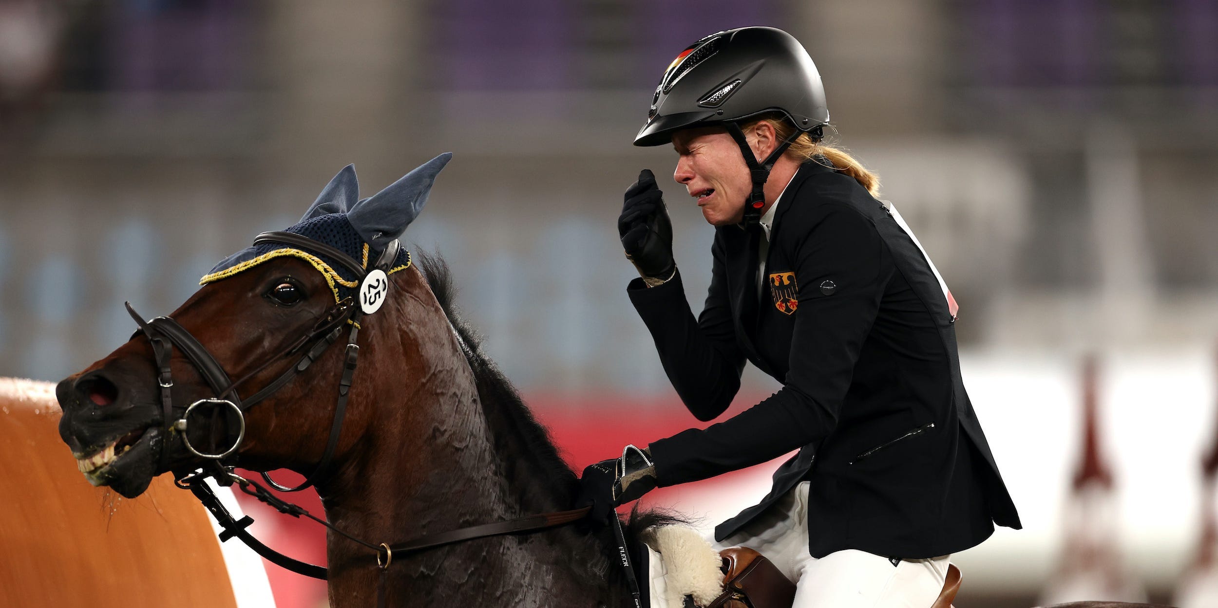 Annika Schleu of Team Germany looks dejected following her run in the Riding Show Jumping of the Women's Modern Pentathlon.