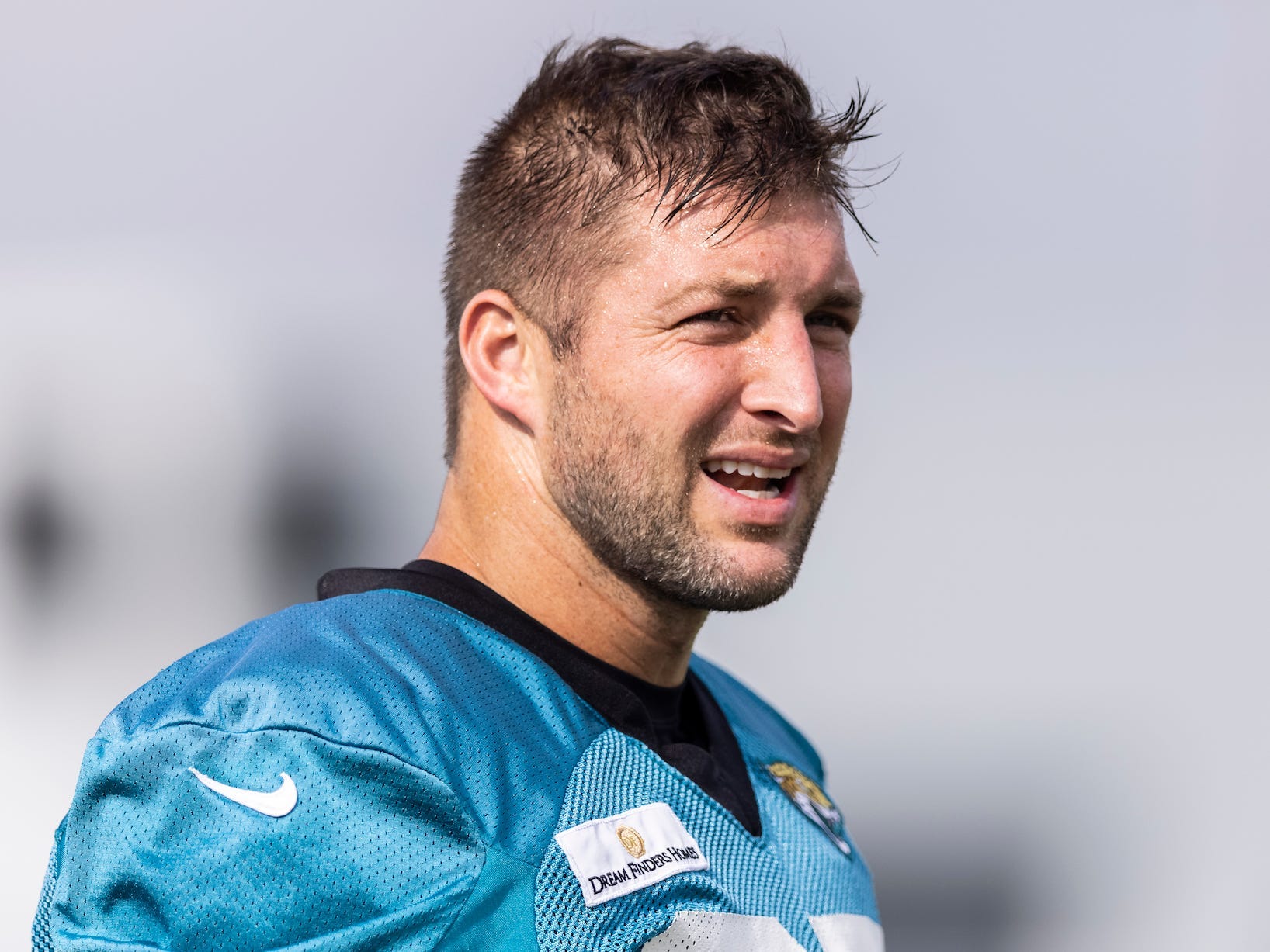 Tim Tebow #85 of the Jacksonville Jaguars looks on during Training Camp at TIAA Bank Field on July 30, 2021 in Jacksonville, Florida.