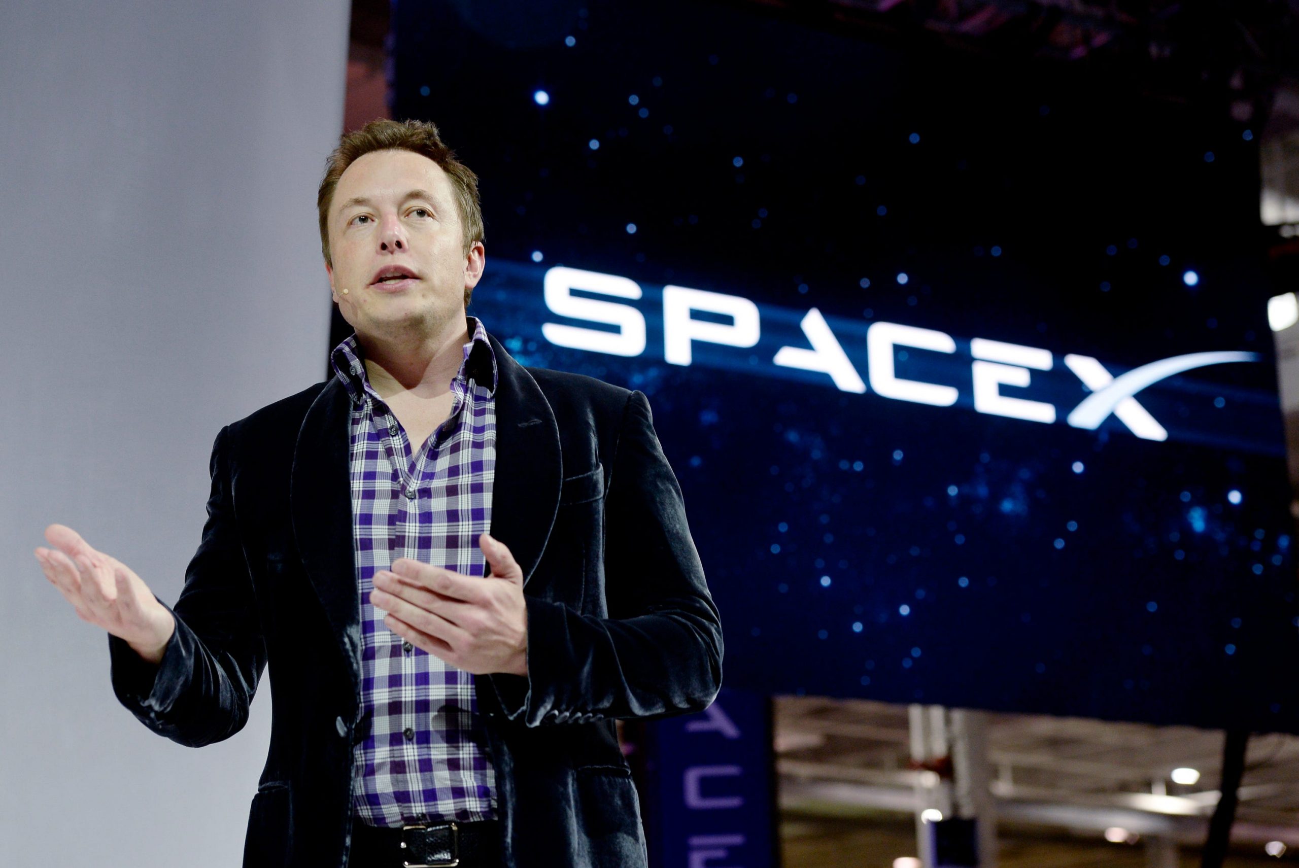 SpaceX CEO Elon Musk unveils the company's new manned spacecraft, The Dragon V2, designed to carry astronauts into space during a news conference on May 29, 2014, in Hawthorne, California.