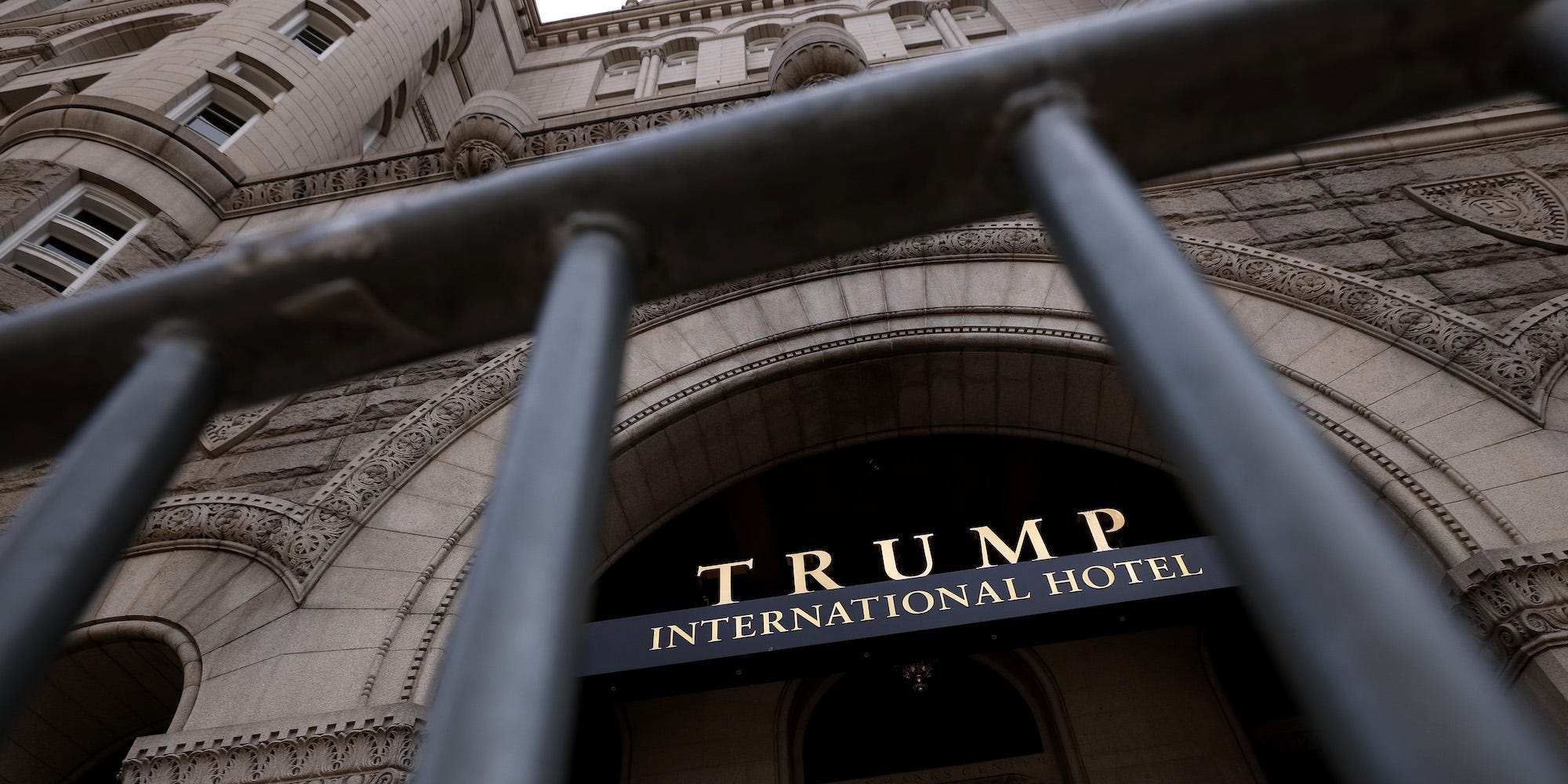 The Trump International Hotel is seen though security fencing on June 02, 2021 in Washington, DC.