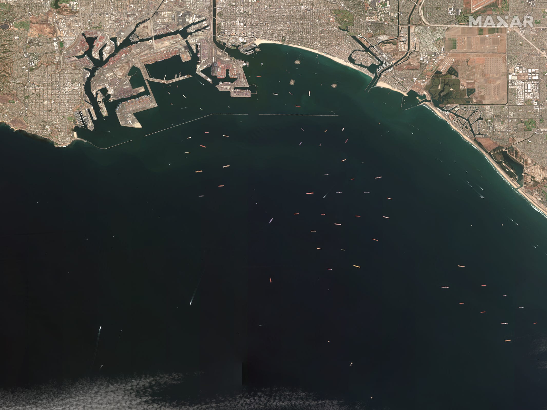 An overhead shot of the shipping backlog off the coast of Long Beach, California.