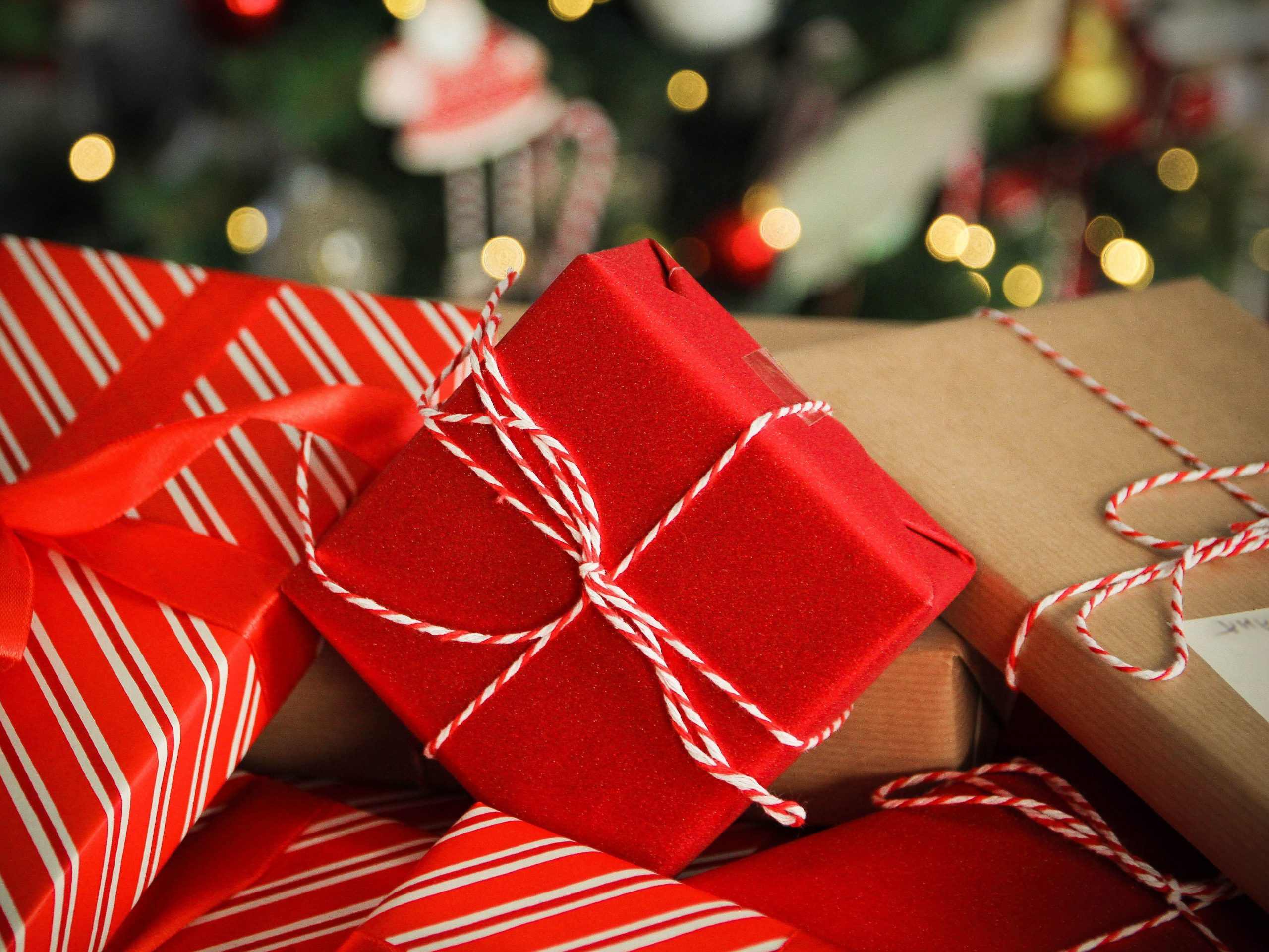 Christmas presents near a decorated tree