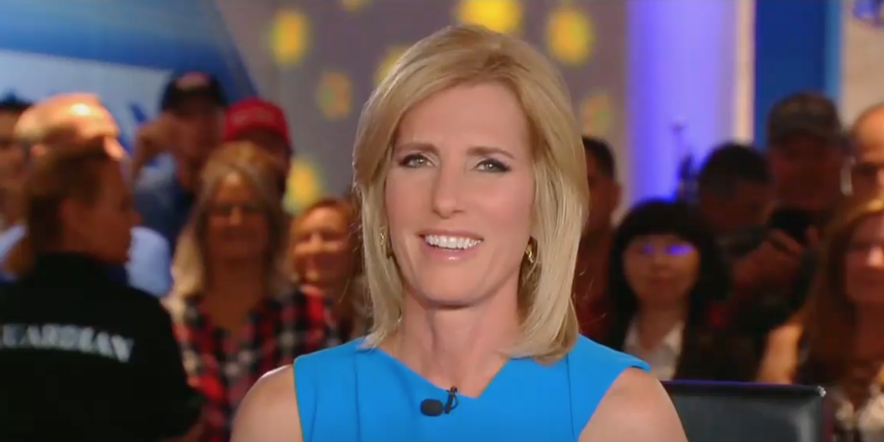 A head-and-shoulders shot of Laura Ingraham smiling, screenshotted from Fox News, with audience in the background