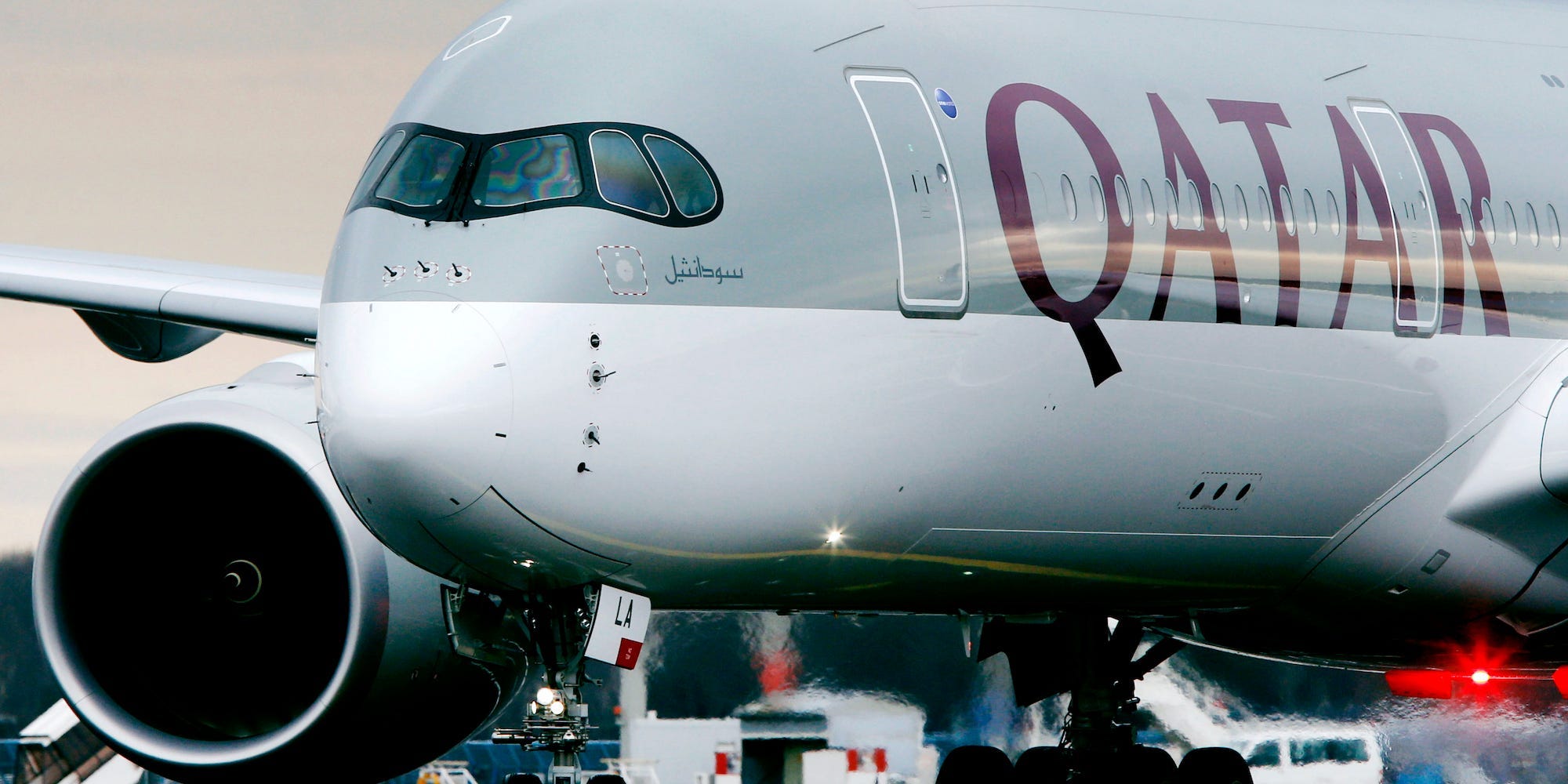 The front of a Qatar Airways plane.