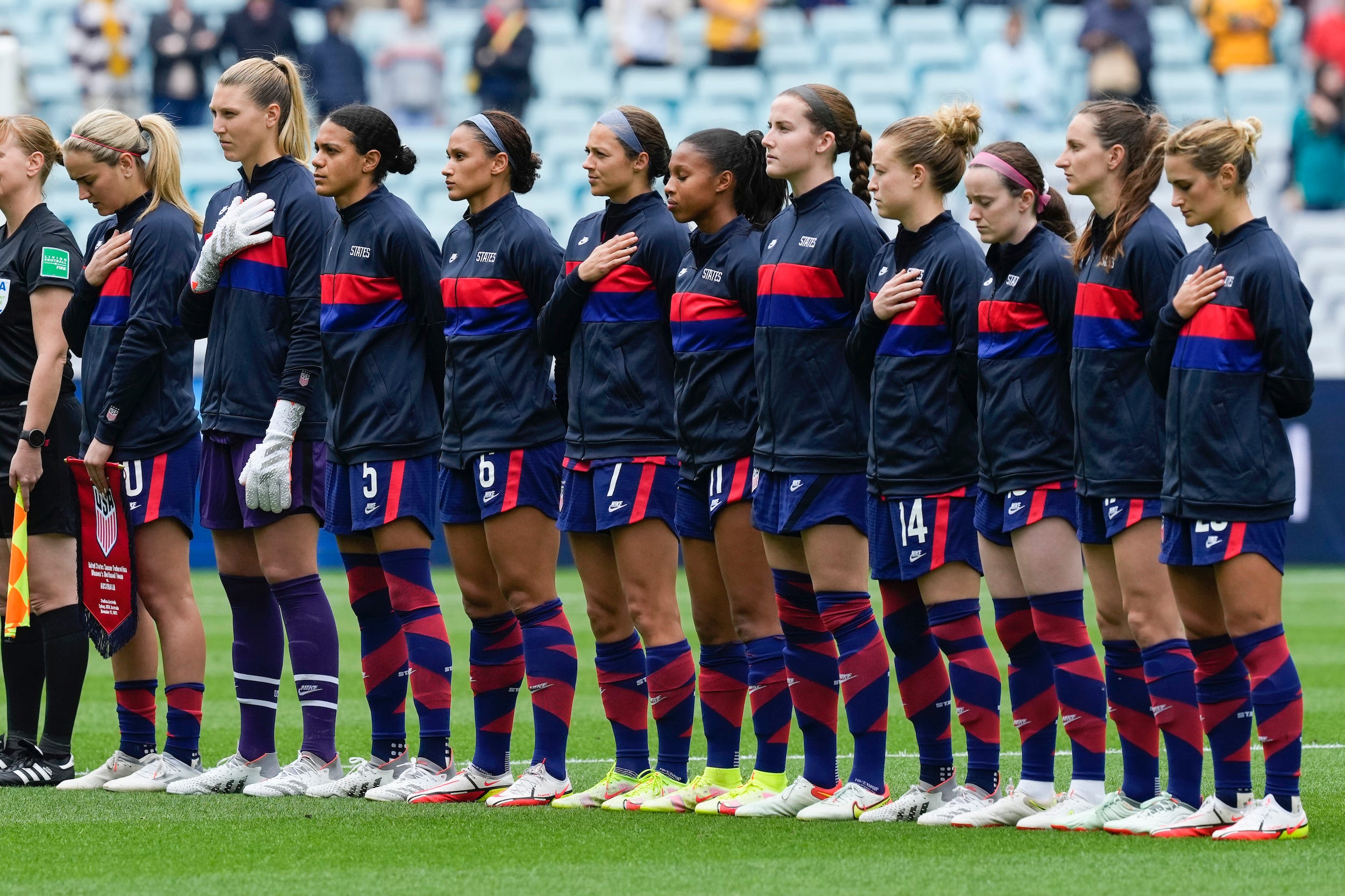 USWNT players line up ahead of a matchup against Australia.