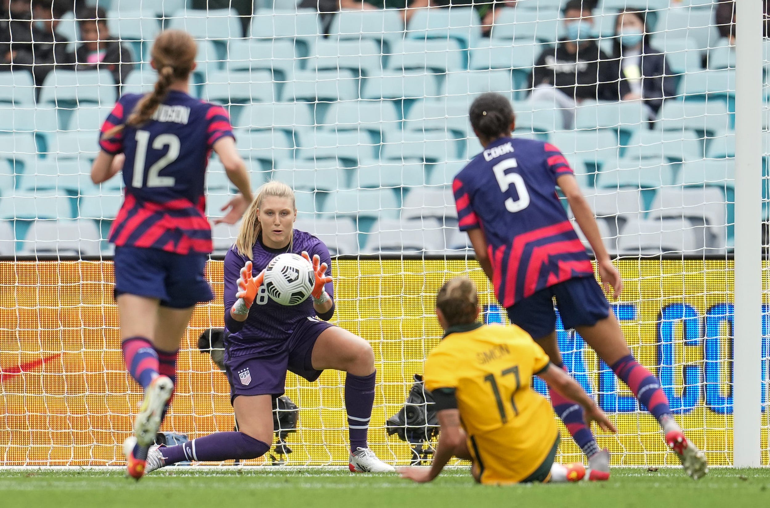 Casey Murphy makes a save for the USWNT against Australia.