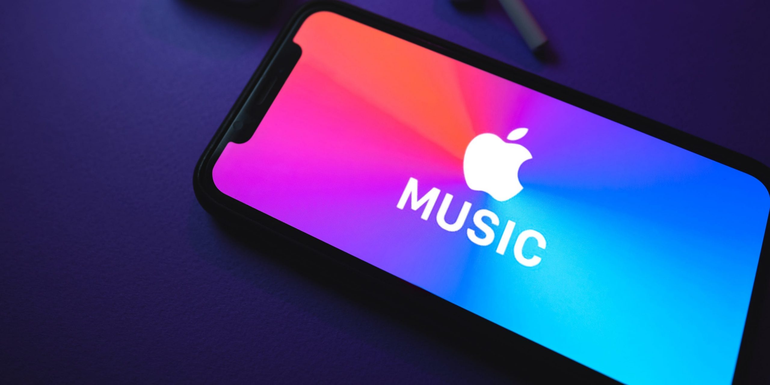 An iPhone displaying the Apple Music logo.