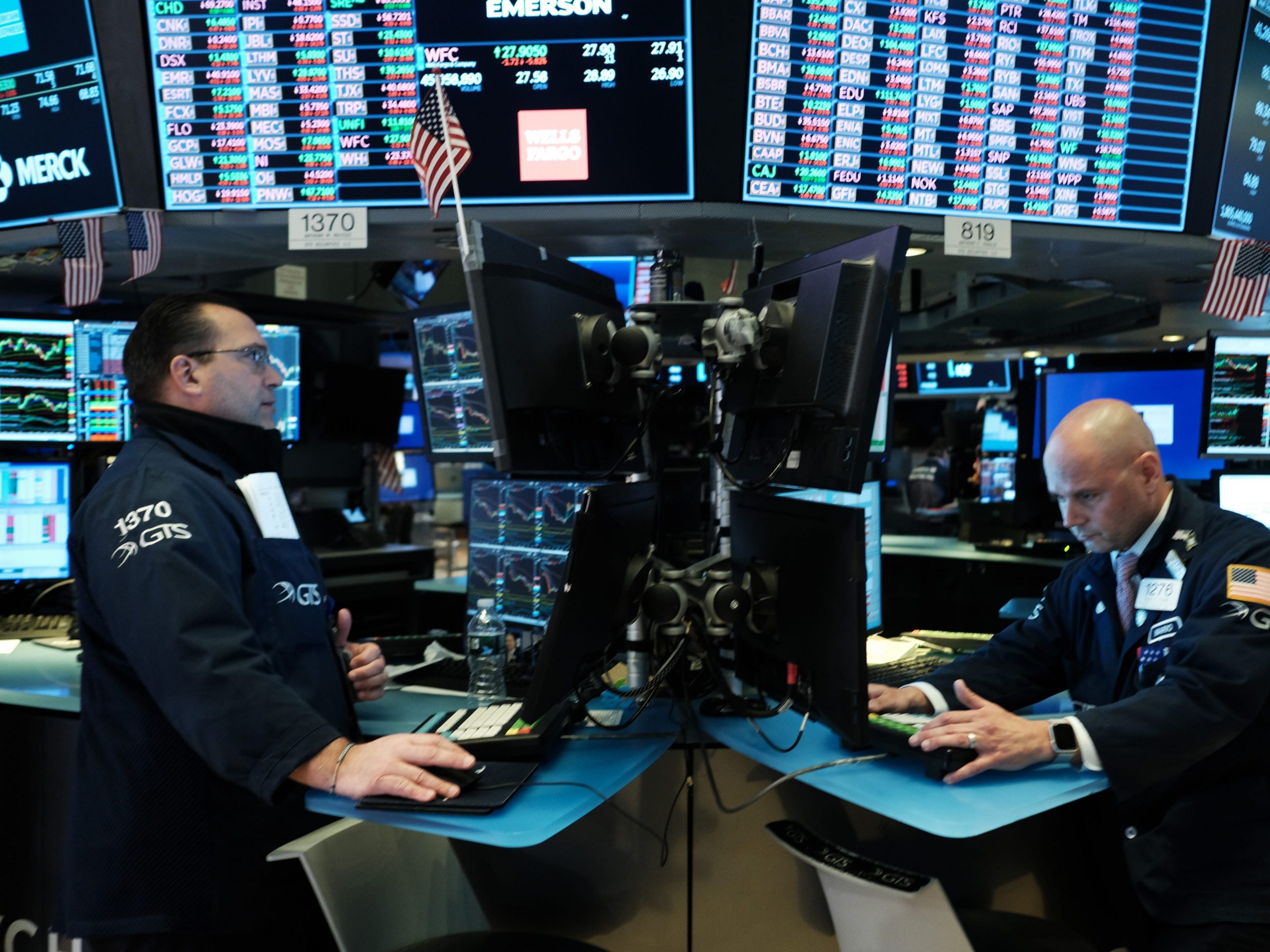 Traders work on the floor of the New York Stock Exchange (NYSE) on March 18, 2020 in New York City. The Dow fell more than 1,200 points today as COVID-19 fears continue to roil world markets. (