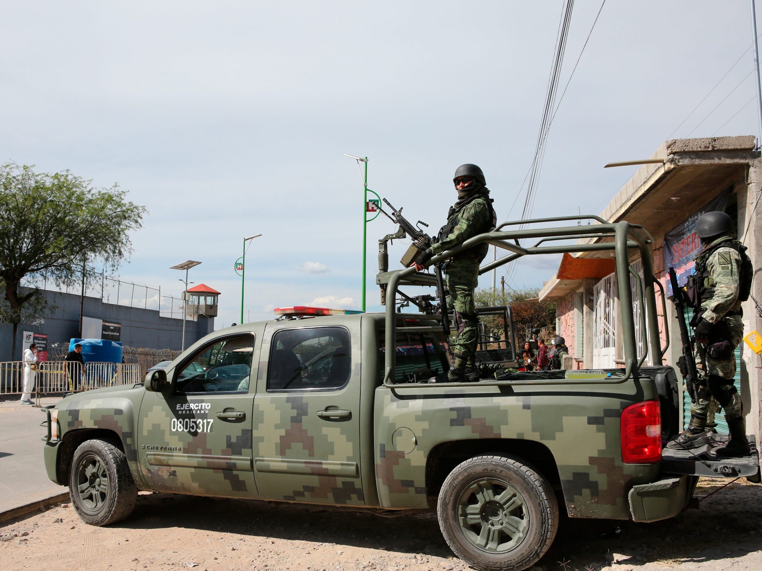 Mexico army soldiers stand guard outside a prison