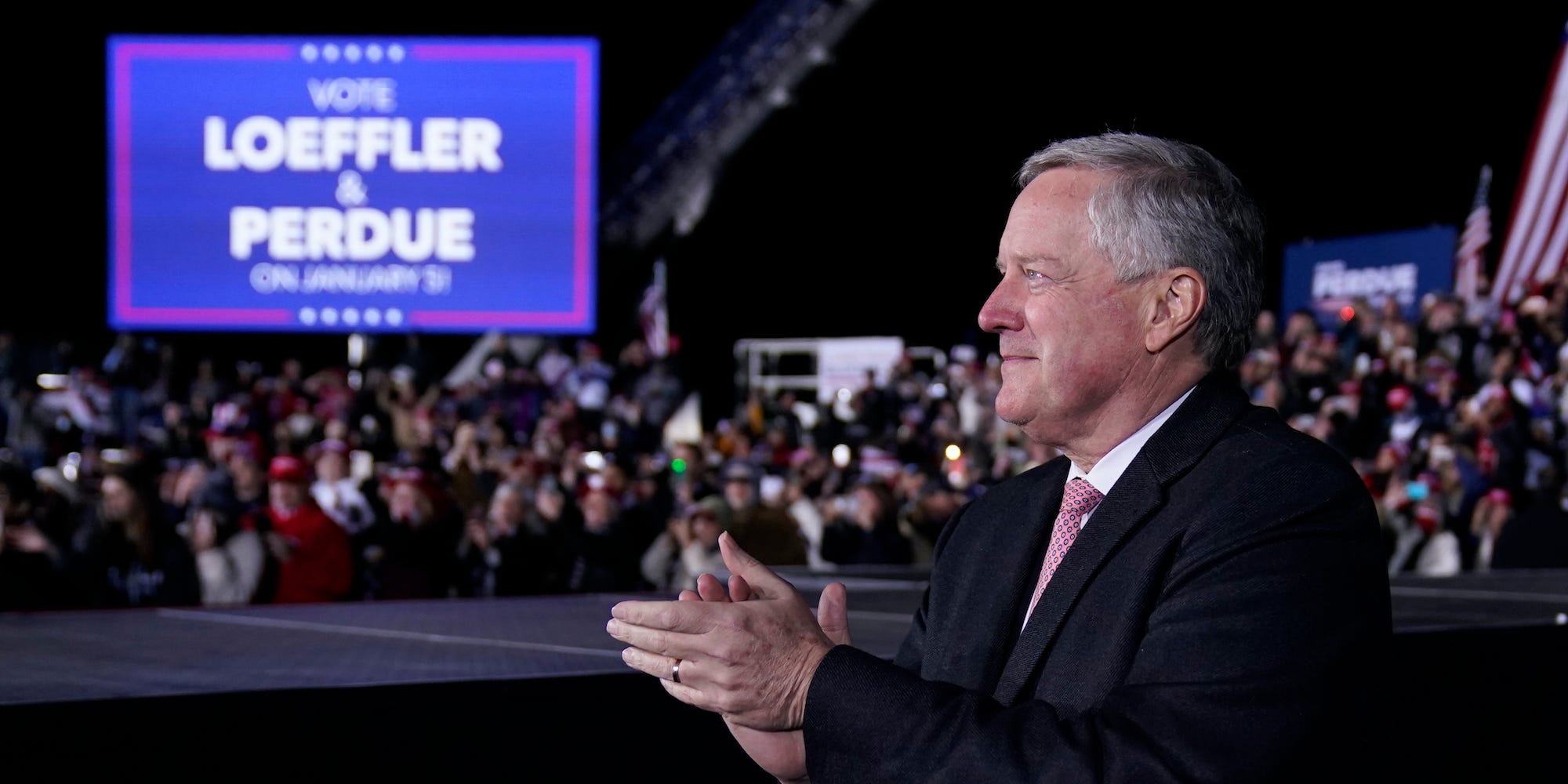 White House chief of staff Mark Meadows listens as President Donald Trump speaks during a campaign rally for Sen. Kelly Loeffler, R-Ga., and David Perdue at Dalton Regional Airport, Monday, Jan. 4, 2021, in Dalton, Ga.