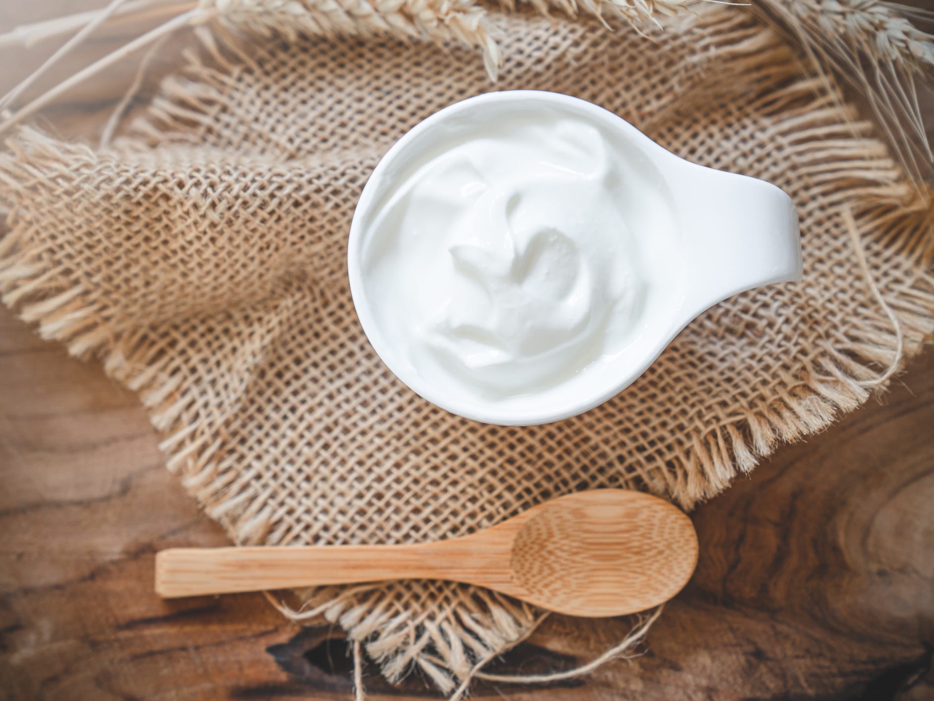 Healthy breakfast with Fresh greek yogurt on background.