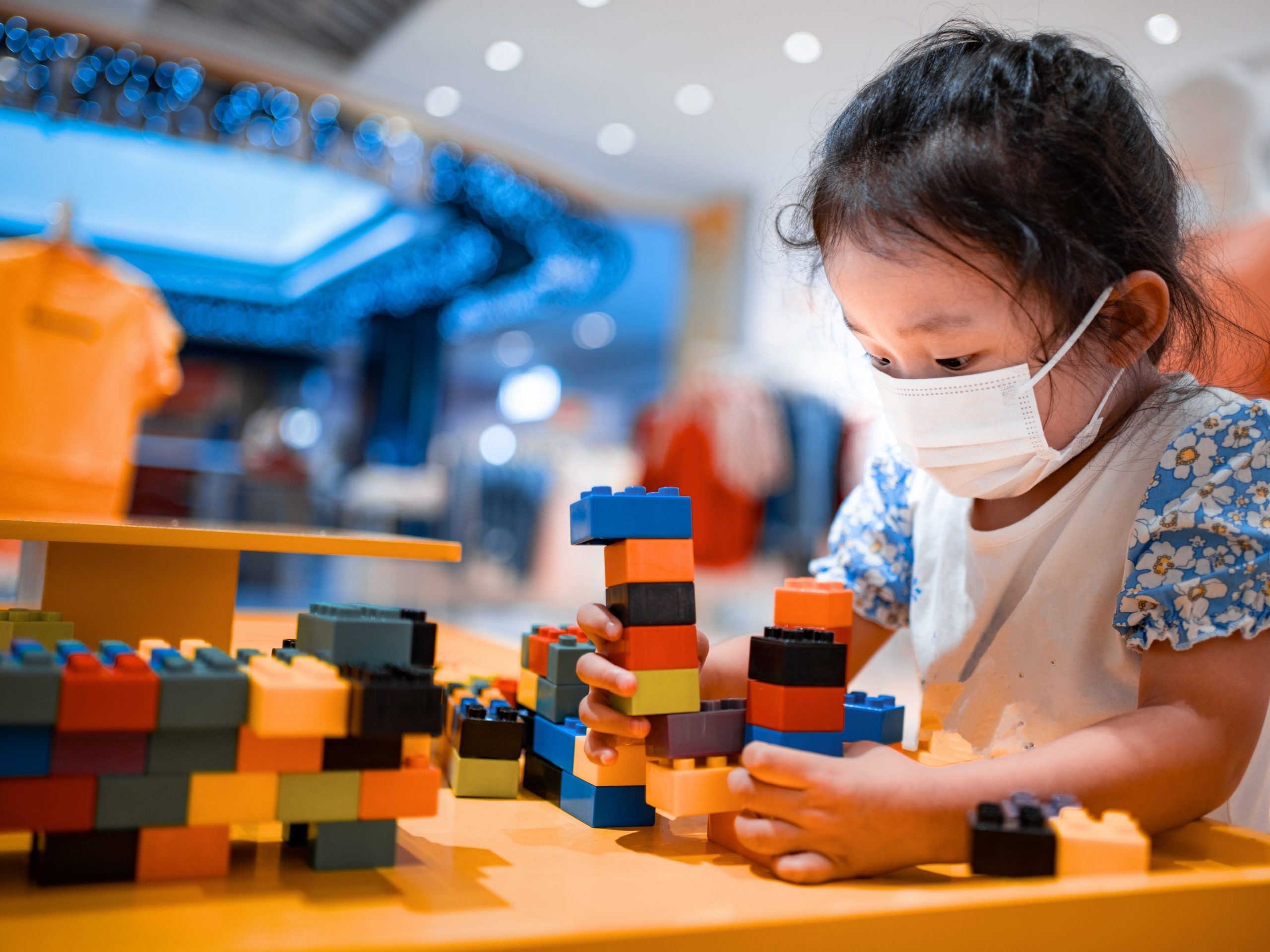 kid in preschool during covid wearing a mask